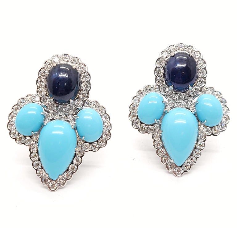 Andreoli Turquoise 2.80 Carat Diamond Sapphire 18 Karat White Gold Earrings

These Earrings Feature:
- 2.80 Carat Diamond
- 11.37 Carat Sapphire
- 20.70 Carat Turquoise
- 20.96 g 18k White Gold
- Made In Italy
