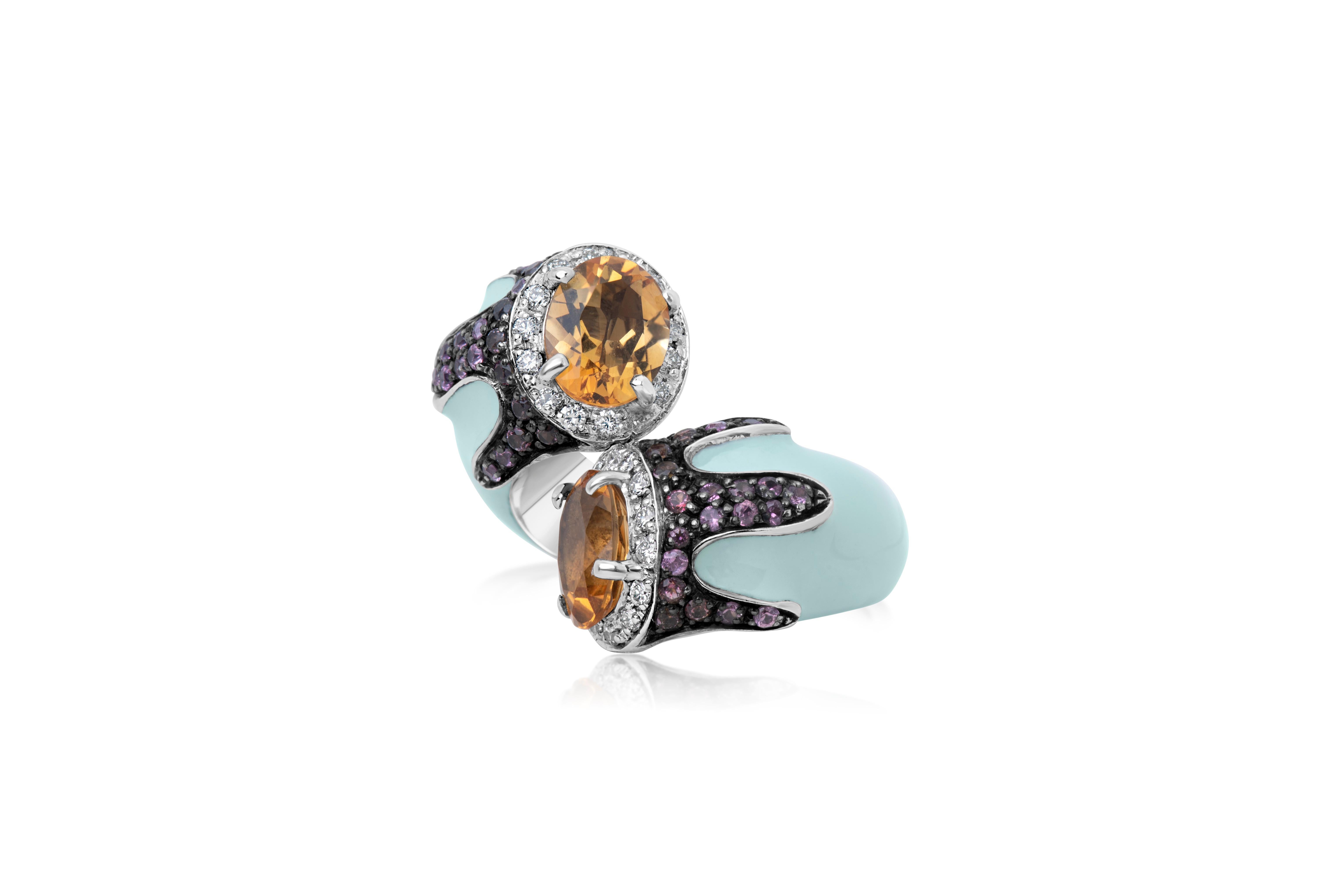 Andreoli Turquoise Enamel Citrine Pink Topaz Diamond Cocktail Ring 18kt Silver

This Andreoli ring features:
- 0.38 carat Diamond (F-G-H Color, VS-SI Clarity)
- 0.43 carat Pink Topaz
- 2.99 carat Citrine
- Turquoise color Enamel
- 18kt Gold
- Silver