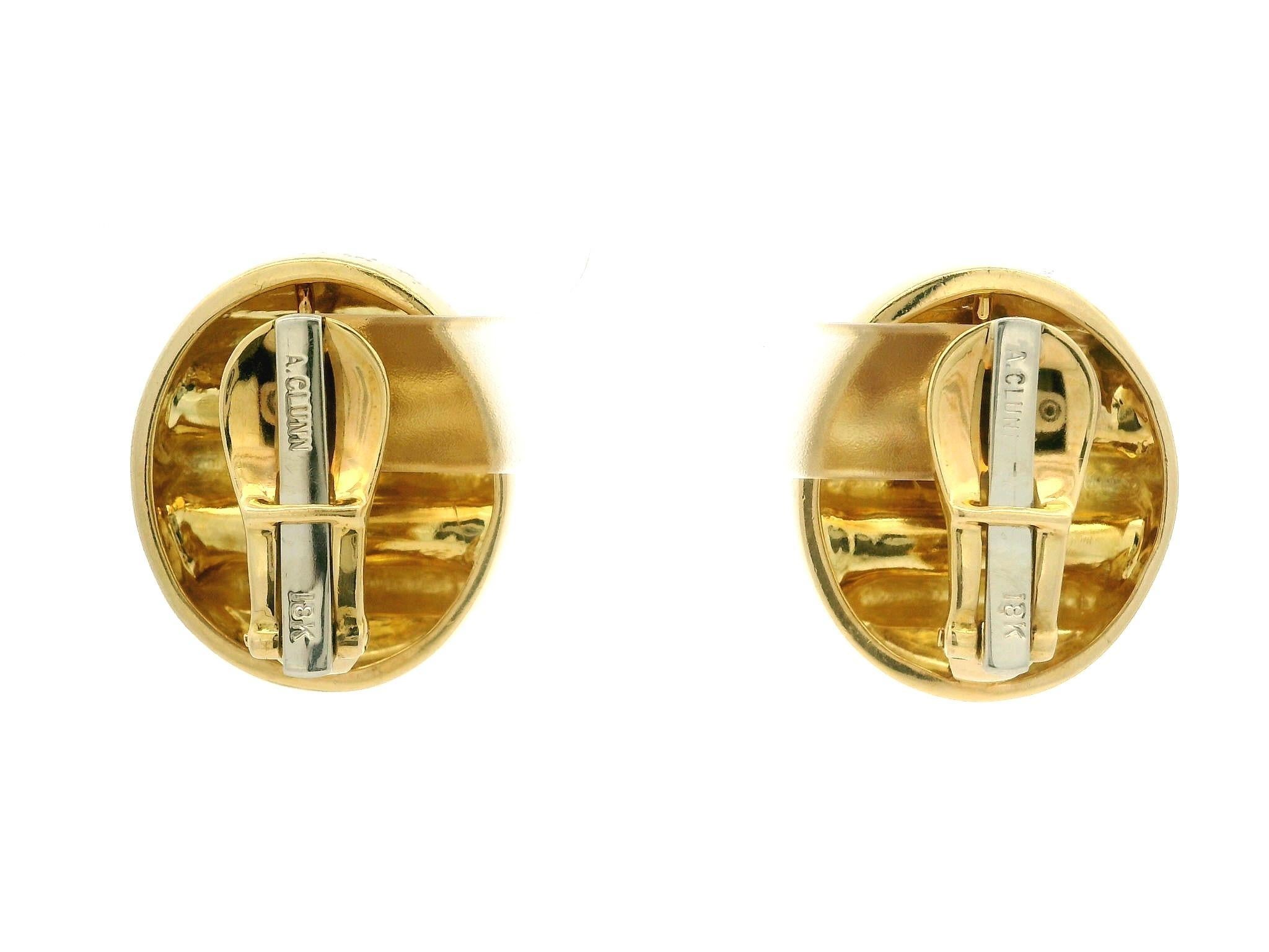 Material: Solid 18k Yellow Gold w/ White Gold Backs
Weight: 24.53 Grams
Backing: Clip On Closures (Pierced ears are NOT required.)
Width: 20.3mm (0.80