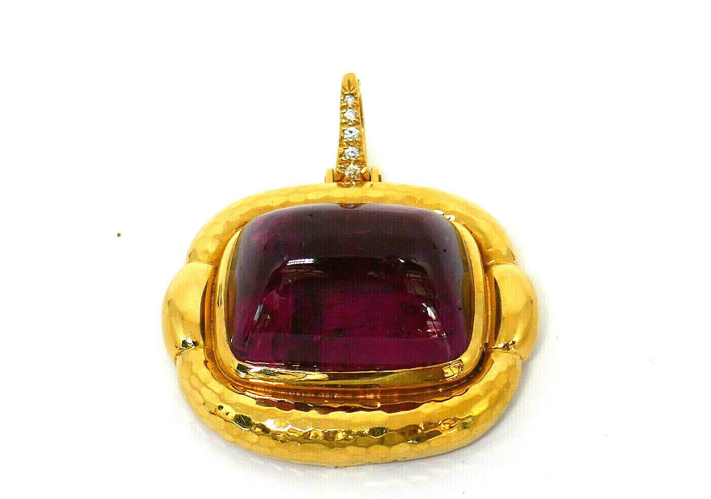 Distinctively chunky, bold pieces from Andrew Clunn. The set contains of a pair of earrings and a pendant. Made of 18k yellow gold, pink tourmaline and diamonds. Perfectly polished, candy-like tourmaline amazingly paired with elegant gold color.