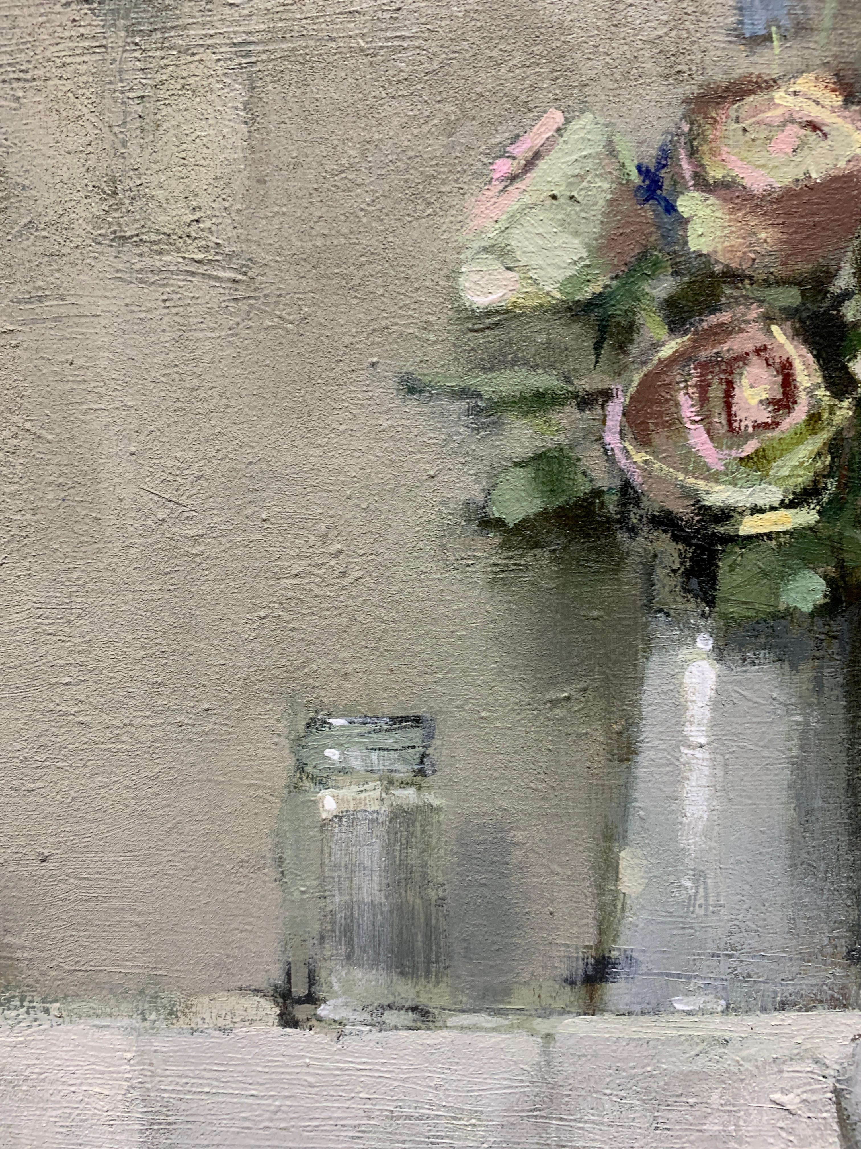 British 20th century White and Pink Roses on a table in an interior still life - Gray Interior Painting by Andrew Davis