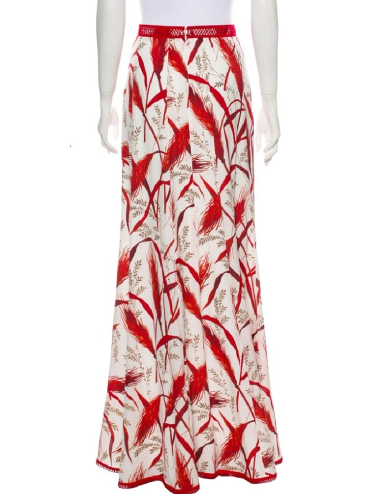 New Andrew GN Silk White Red Maxi Skirt
Andrew Gn's artistry-inspired pieces continue through its Resort 2018 collection. 
This white skirt is crafted in France from midweight silk-georgette with a red rye-print and is cut for a high rise falling to