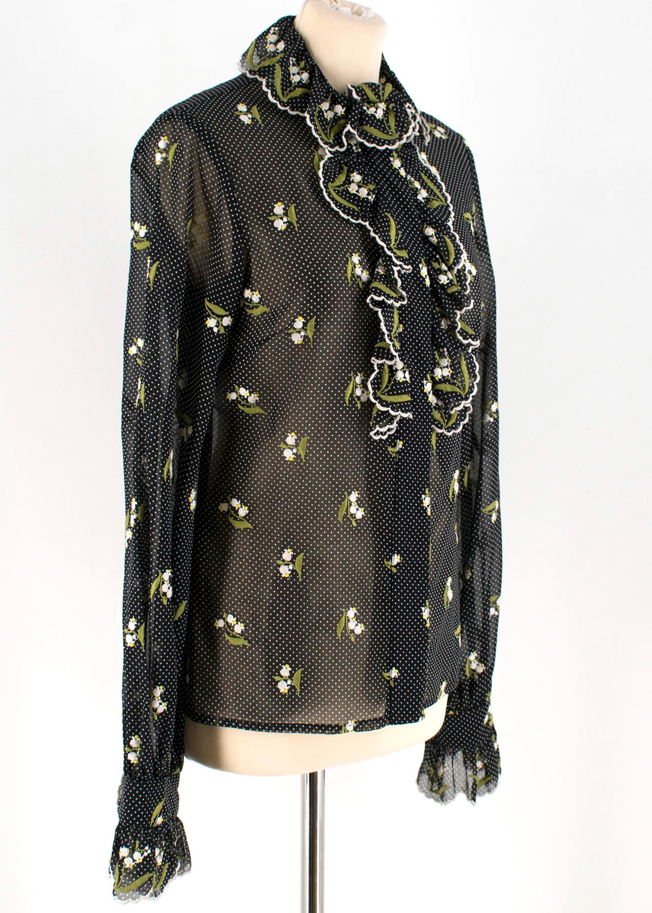 Andrew GN Black Polka Dot Embroidered Shirt

- black sheer shirt
- long sleeve
- white polka dot embellishment 
- thread flowers embellishment 
- ruffle collar and trim
- hidden push button fastening

Please note, these items are pre-owned and may