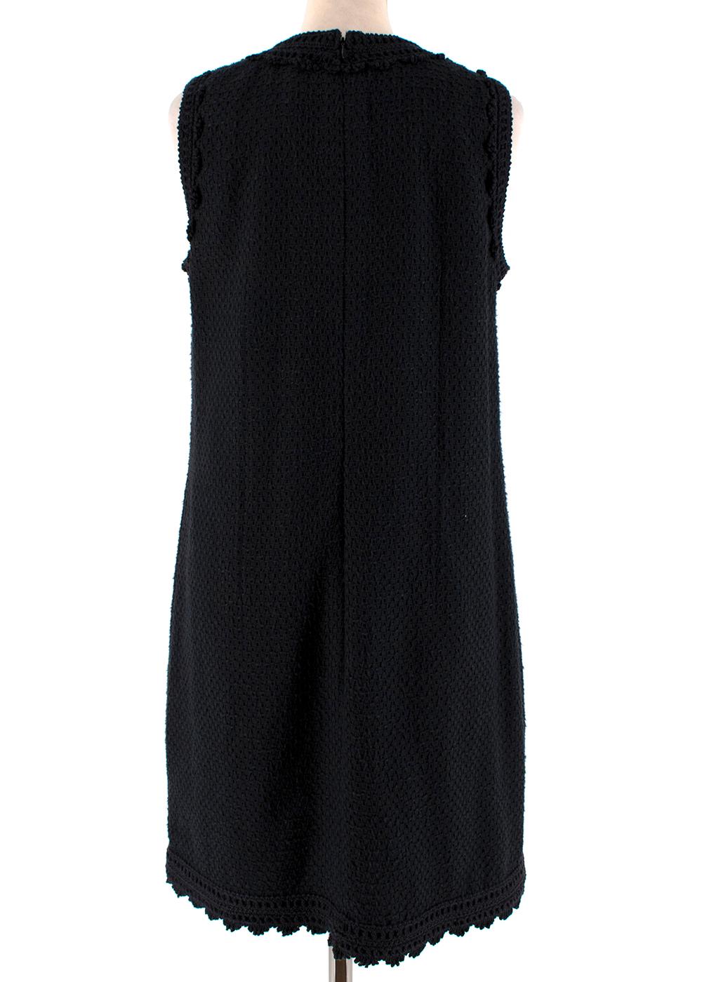 Andrew GN Black Cotton Dress

- x2 Outer Pockets
- Buttoned Detail 
- Reverse Zip
- Laced Detail Hems

Made in France 
Measurements are taken laying flat, seam to seam. 

Chest - 40cm
Length - 91cm
