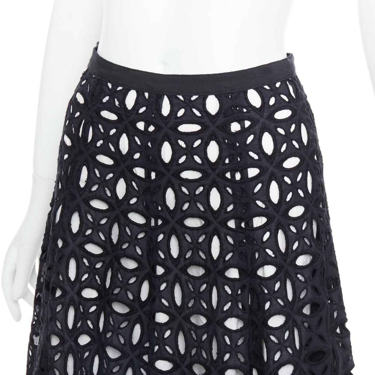 ANDREW GN black white cotton embroidery anglais midi full skirt FR36 S
Reference: LNKO/A02561
Brand: Andrew Gn
Material: Cotton
Color: Black, White
Pattern: Lace
Closure: Zip
Lining: White Cotton
Extra Details: White cotton lined.
Made in: