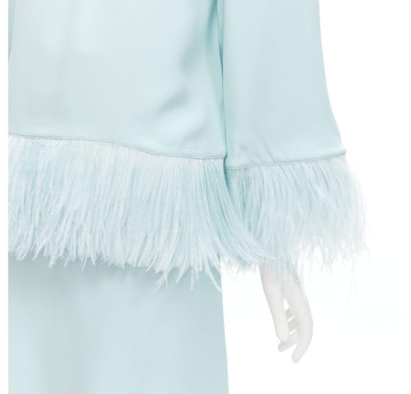 ANDREW GN light blue feather trim high neck flared top midi skirt set FR34 XS
Reference: AAWC/A00346
Brand: Andrew Gn
Material: Viscose, Blend
Color: Blue
Pattern: Solid
Closure: Zip
Made in: France

CONDITION:
Condition: Excellent, this item was