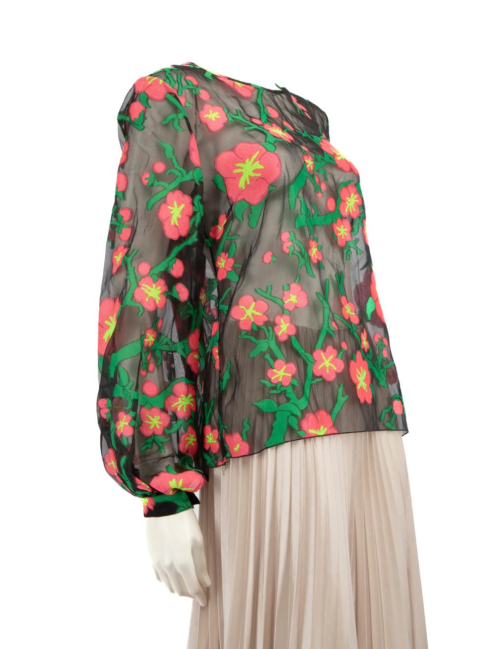 CONDITION is Very good. Minimal wear to the top is evident. Button on the left cuff is missing on this used Andrew Gn designer resale item.
 
 Details
 SS15
 Black
 Polyester
 Blouse
 Floral print
 See through
 Long sleeves
 Round neck
 Back zip and
