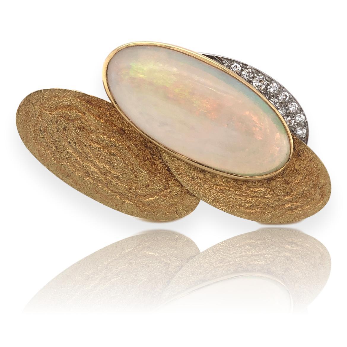 White Opal Gold and Diamond ring by Andrew Grima. The  2 