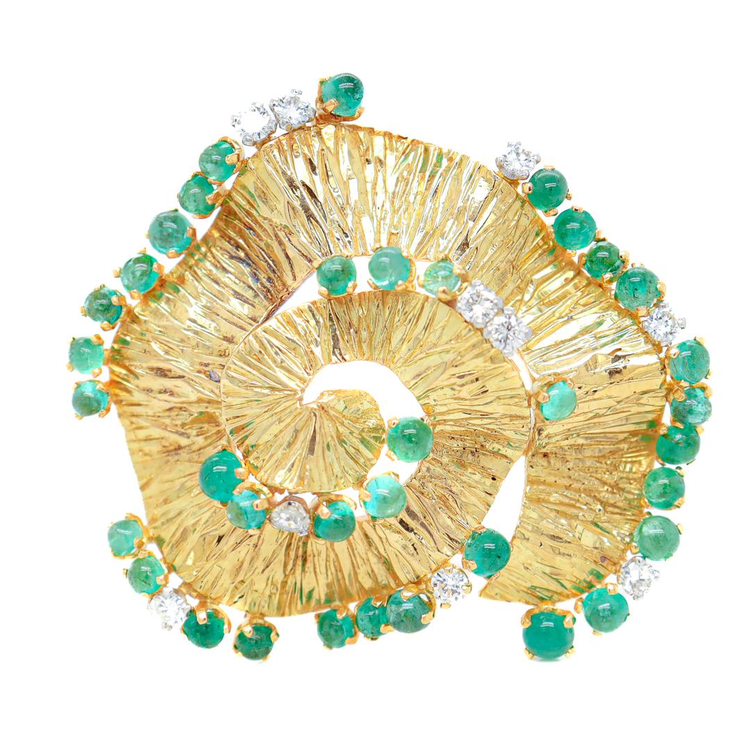 A very fine 18k gold, emerald, and diamond modernist brooch.

Attributed to Andrew Grima. 

Comprising a textured spiral in 18k yellow gold with prong set round smooth emerald cabochons and round brilliant diamonds on the spiral's edge. 

Hallmarked