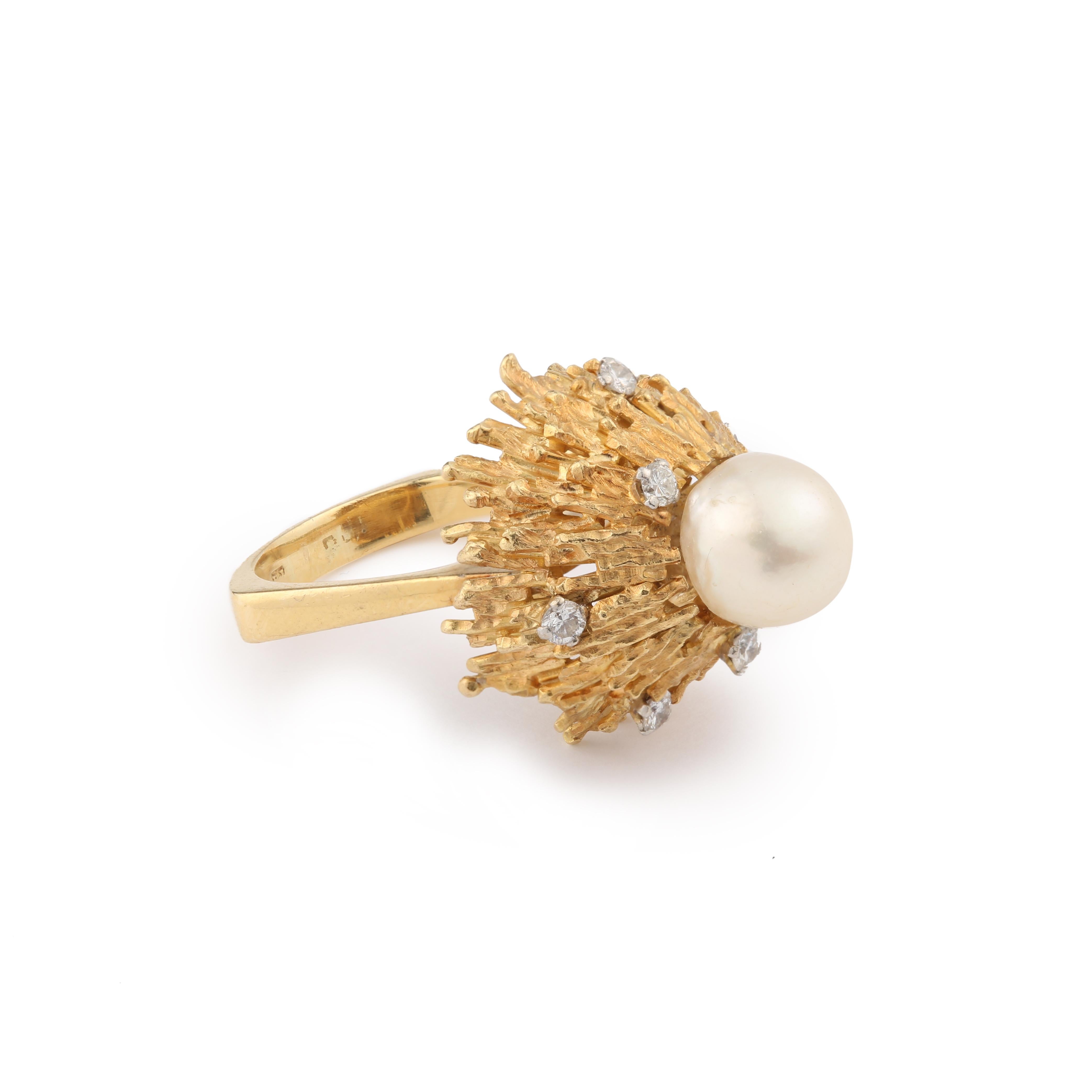 Andrew Grima ring featuring a granite gold dome set with diamonds and its top with a pearl.

Signature H.J. Co. (One of the first stamp that Andrew Grima used before he created his own) slightly faded due to sizing.

The Haller Jewellery Company