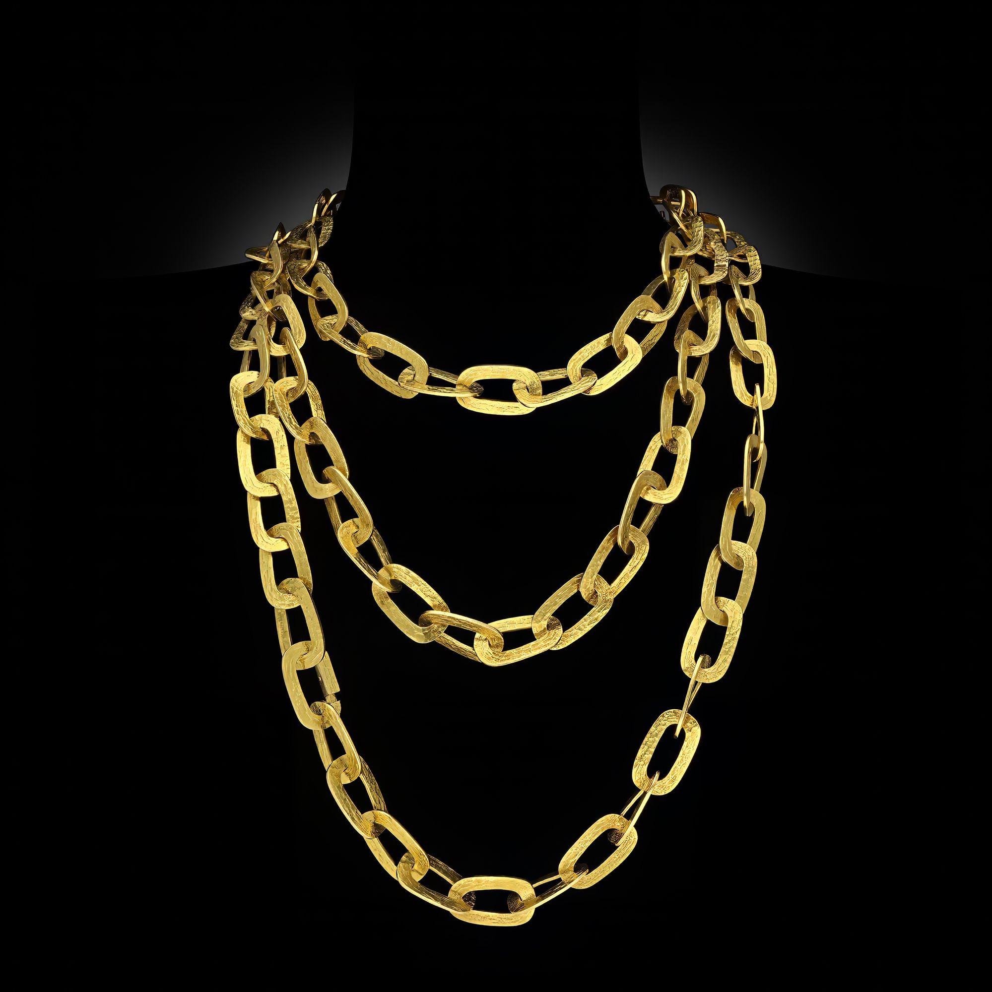 Collar largo sautoir vintage de oro amarillo de 18 ct de Andrew Grima, 1975. Este collar se puede unir en un solo largo o separar en cuatro cadenas separadas de distintas longitudes. Los eslabones de oro amarillo texturizado, cada uno de tamaño y