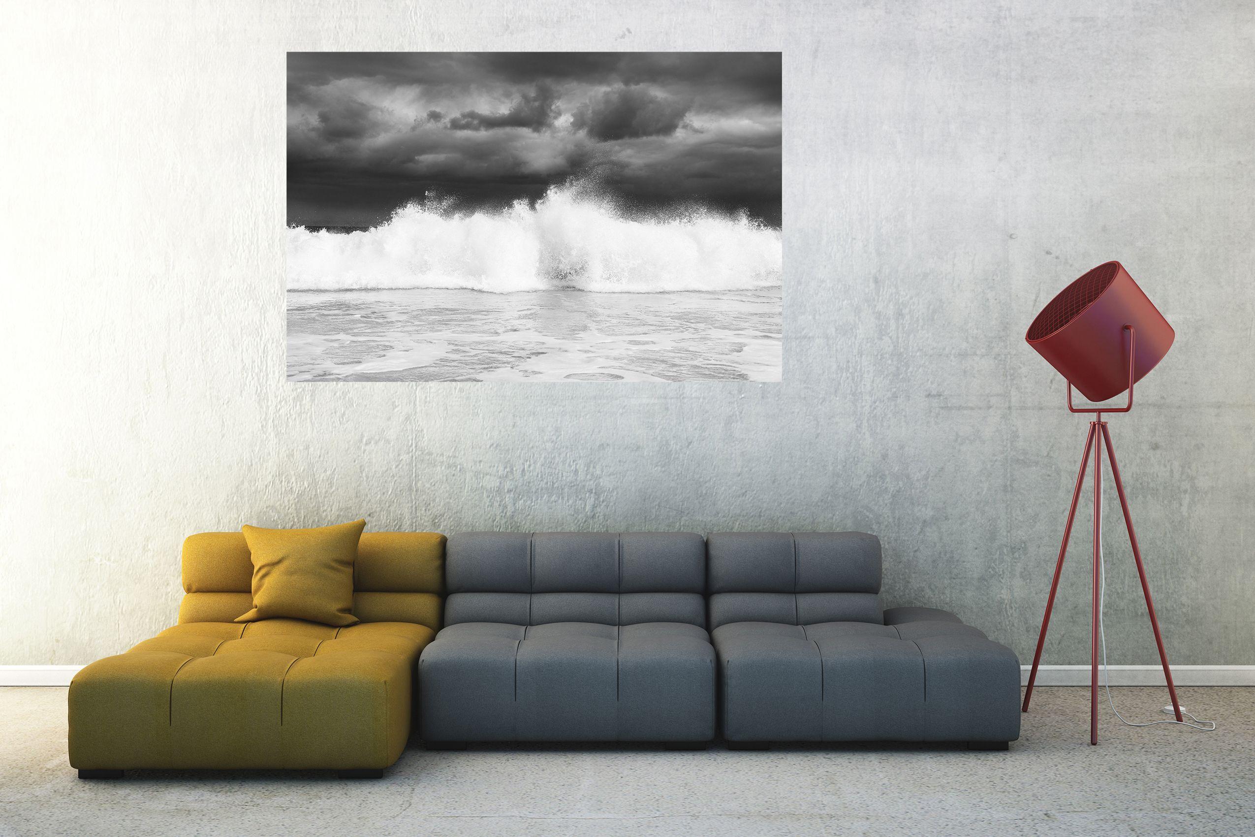 The storm was clearing over the sea leaving a dark brooding sky and the fresh sunlight hit the crashing wave. Andrew has created a wonderfully dramatic black and white print here which would look ideal in any beach house or even an escape in a city