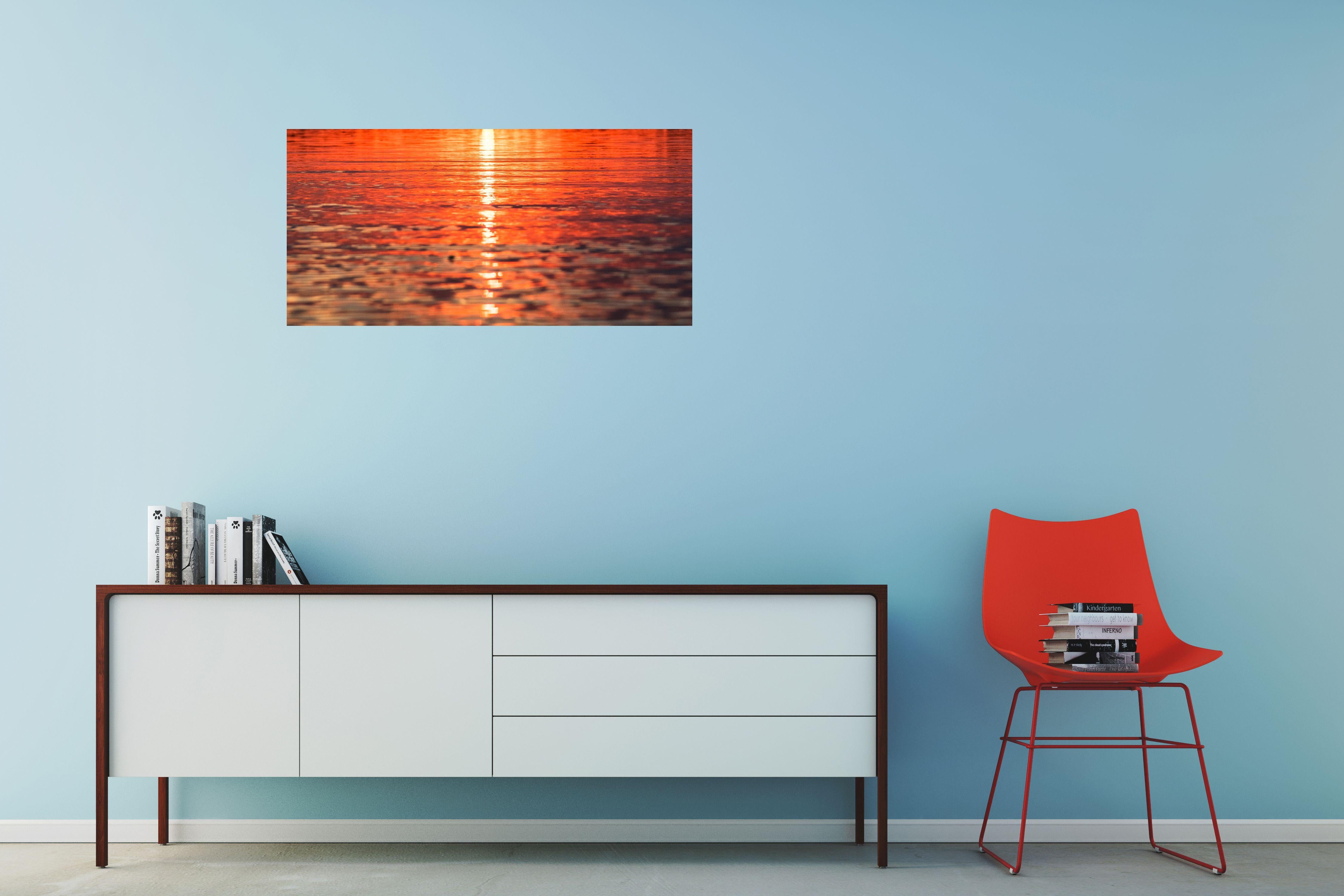 One of a series of images where Andrew has used a paddle board to capture a minimalist colour artwork. Laying down on the board created a unique perspective of the sea. This wonderful vibrant colour print shows that nature is the best artist