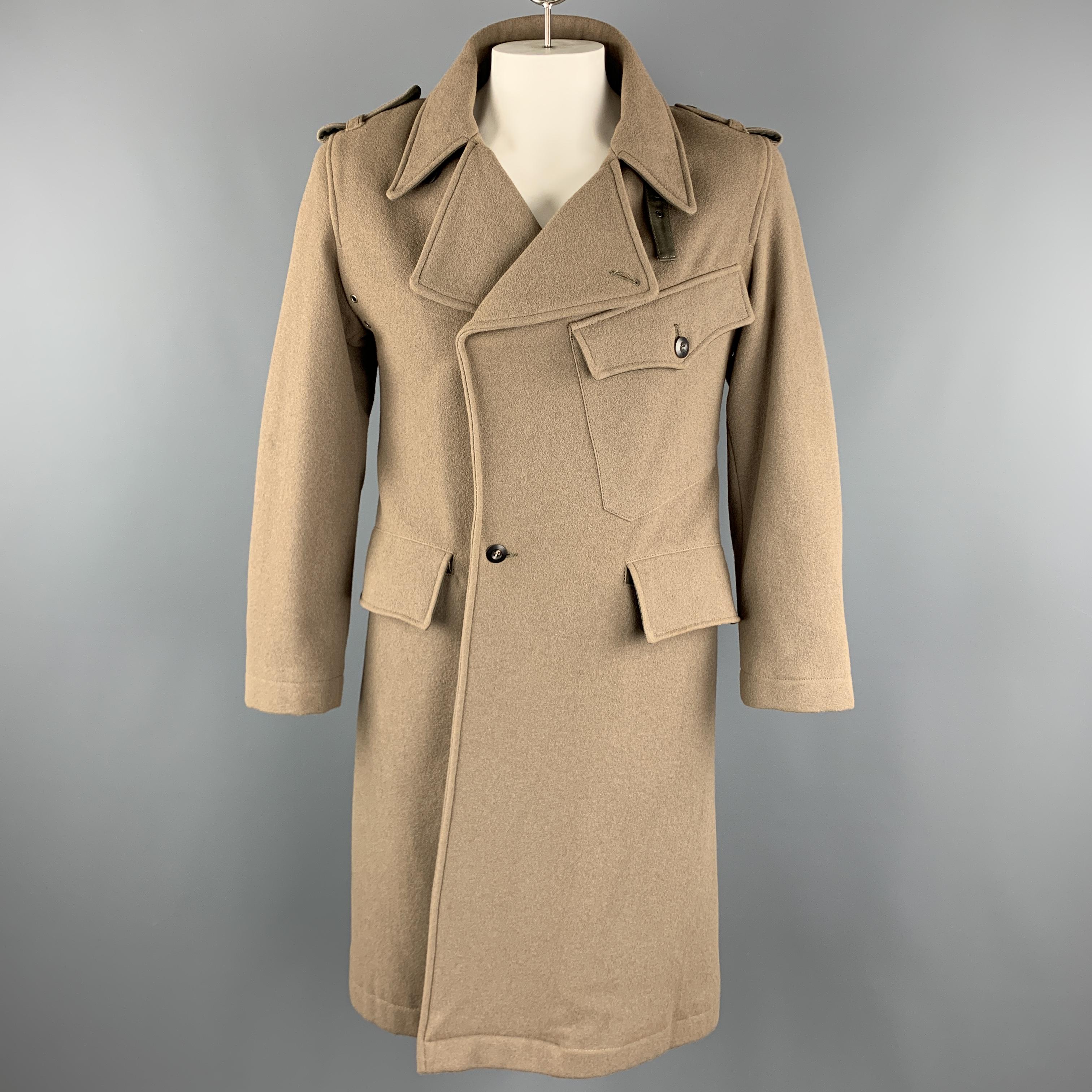ANDREW MACKENZIE Long Coat comes in a taupe solid wool blend material, with a peak lapel, epaulettes, double breasted, patch and flap pockets, and antique gold tone metal buttons at cuffs. Made in Italy. 

Excellent Pre-Owned Condition.
Marked: No