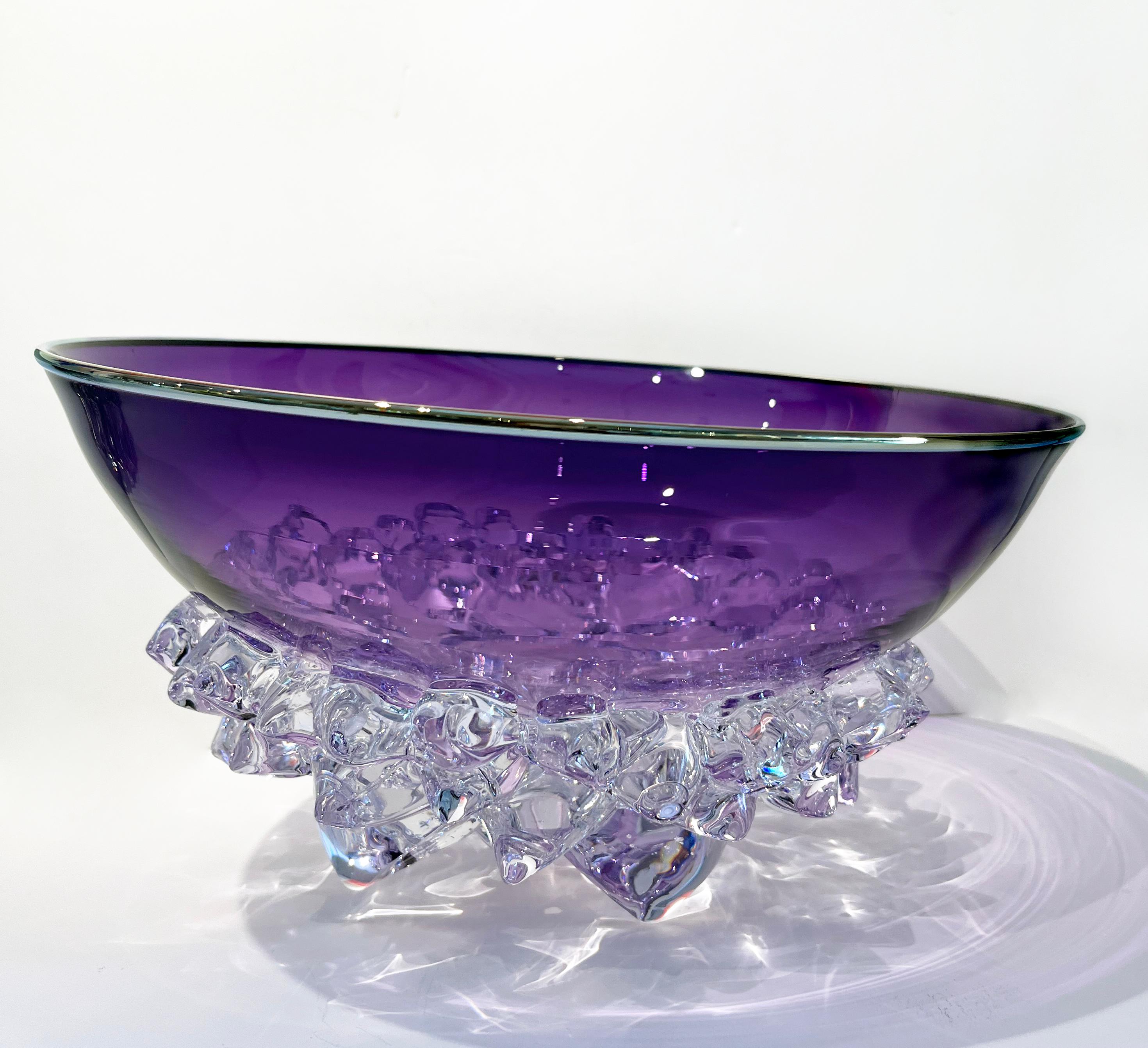 As a student and instructor of glass blowing for over twenty years, Andrew Madvin has an extremely unique vision when it comes to contemporary glass. 

Studying at many different schools across the United States, including the world-renowned