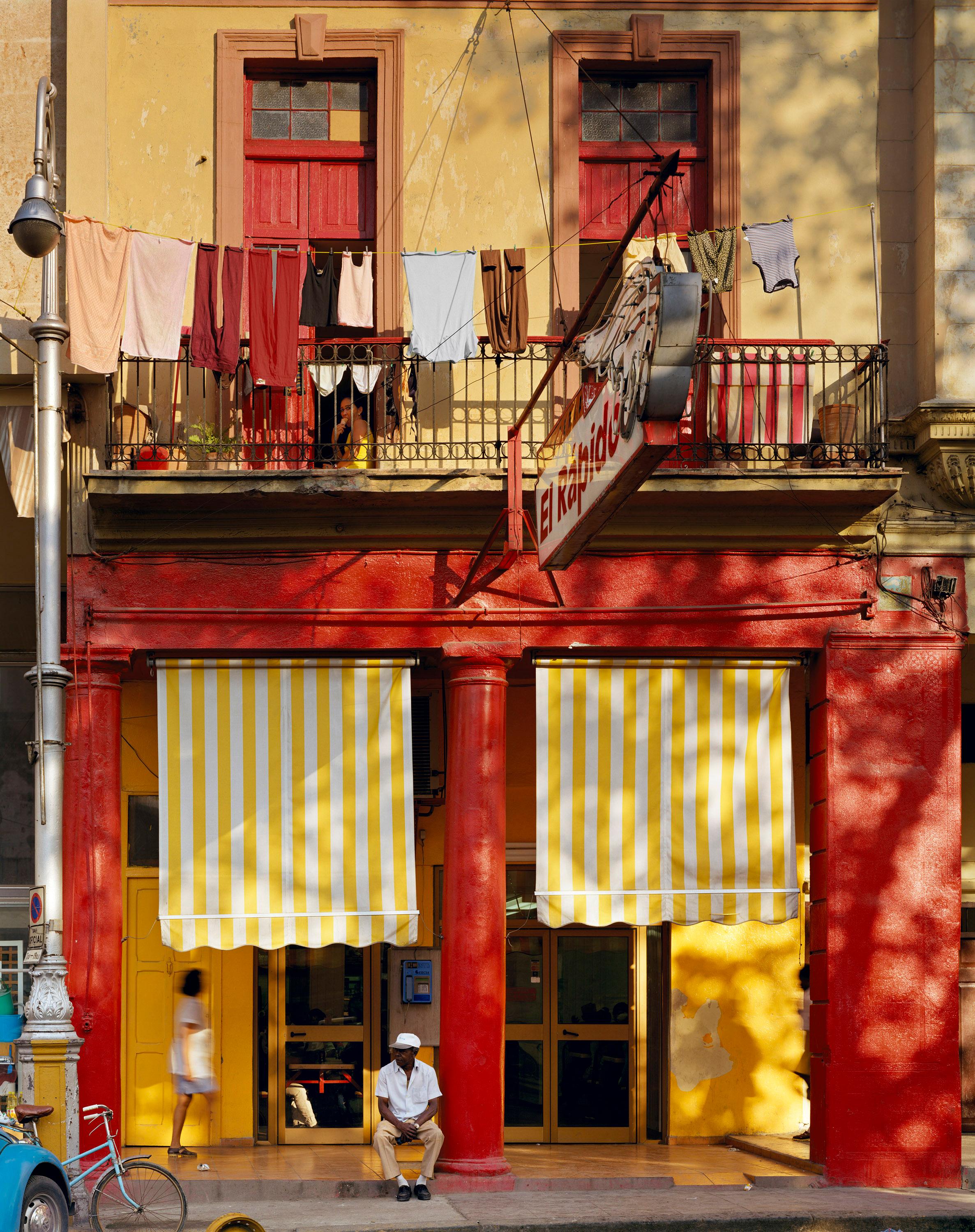 Archival Pigment Print

The Cuban version of McDonalds

All available sizes &amp; editions for each size of this photograph:
50" X 60"- Edition of 5 + 2 Artist Proofs
70" X 90"-  Edition of 5 + 2 Artist Proofs

This photograph will be printed once