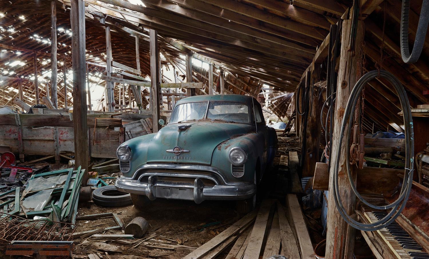 Andrew Moore - Oldsmobile in Barn, Photography 2014, Printed After