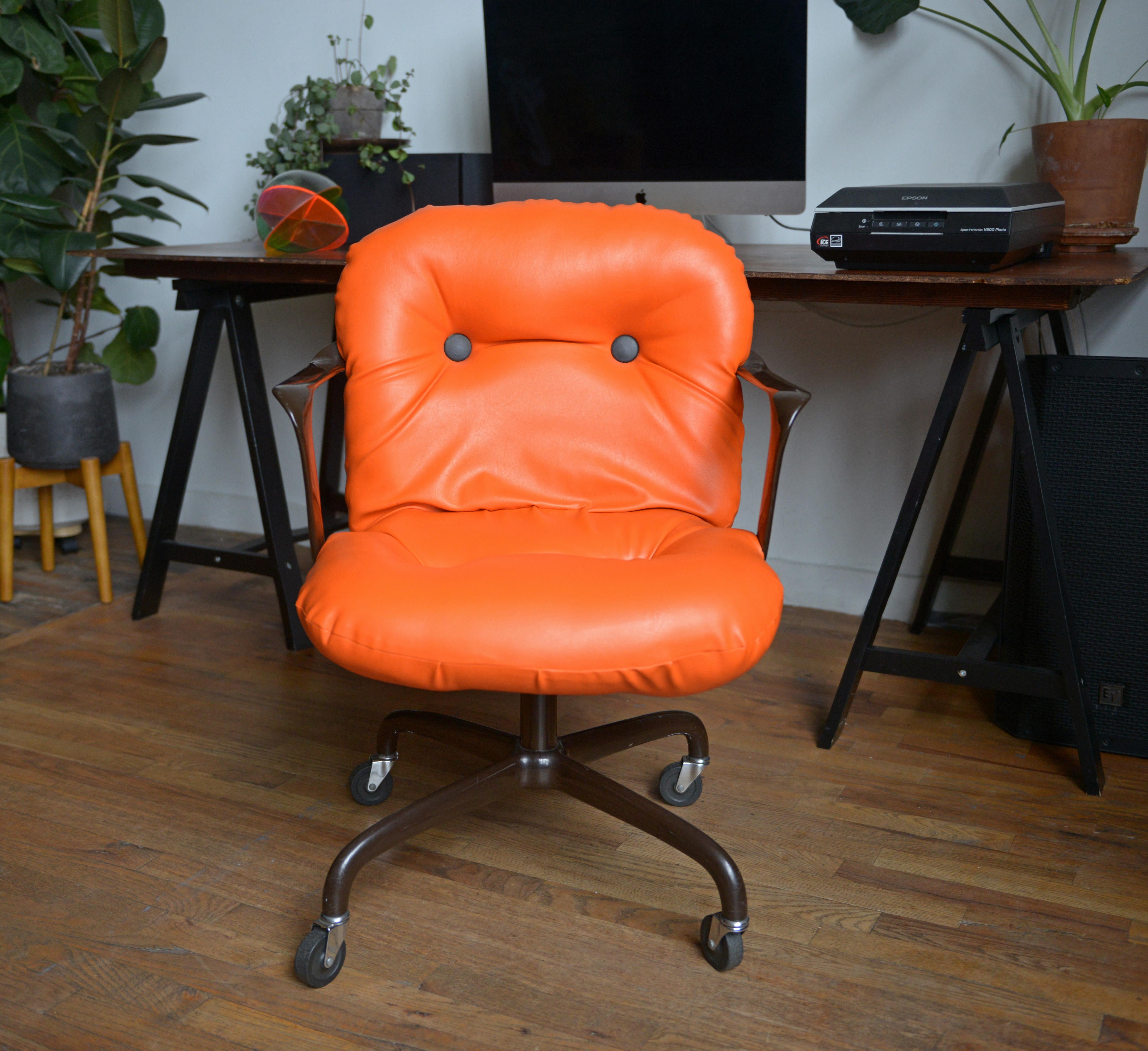 An office chair to remember. This Andrew Morrison & Bruce Hannah Model 2328 Chair For Knoll International in Orange is the perfect statement piece for any living room or office space. comfortable yet very stylish! Signed with Knoll label on bottom.