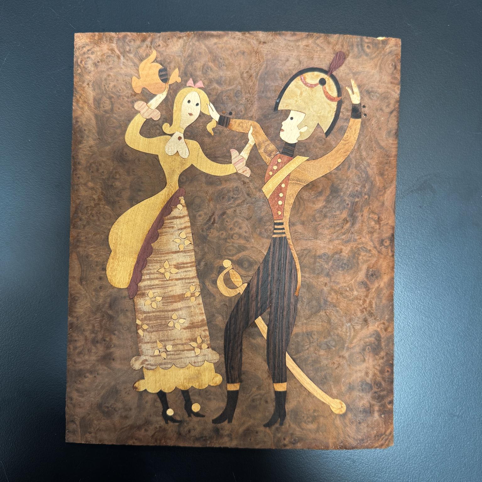 For your consideration, a beautiful wood marquetry art using solid layers of multiple veneers. Attributed to Andrew Szoeke, unsigned.  The art featured couples dancing with unique customs. USA circa the late 1930s early 1940s. Mid Century Modern