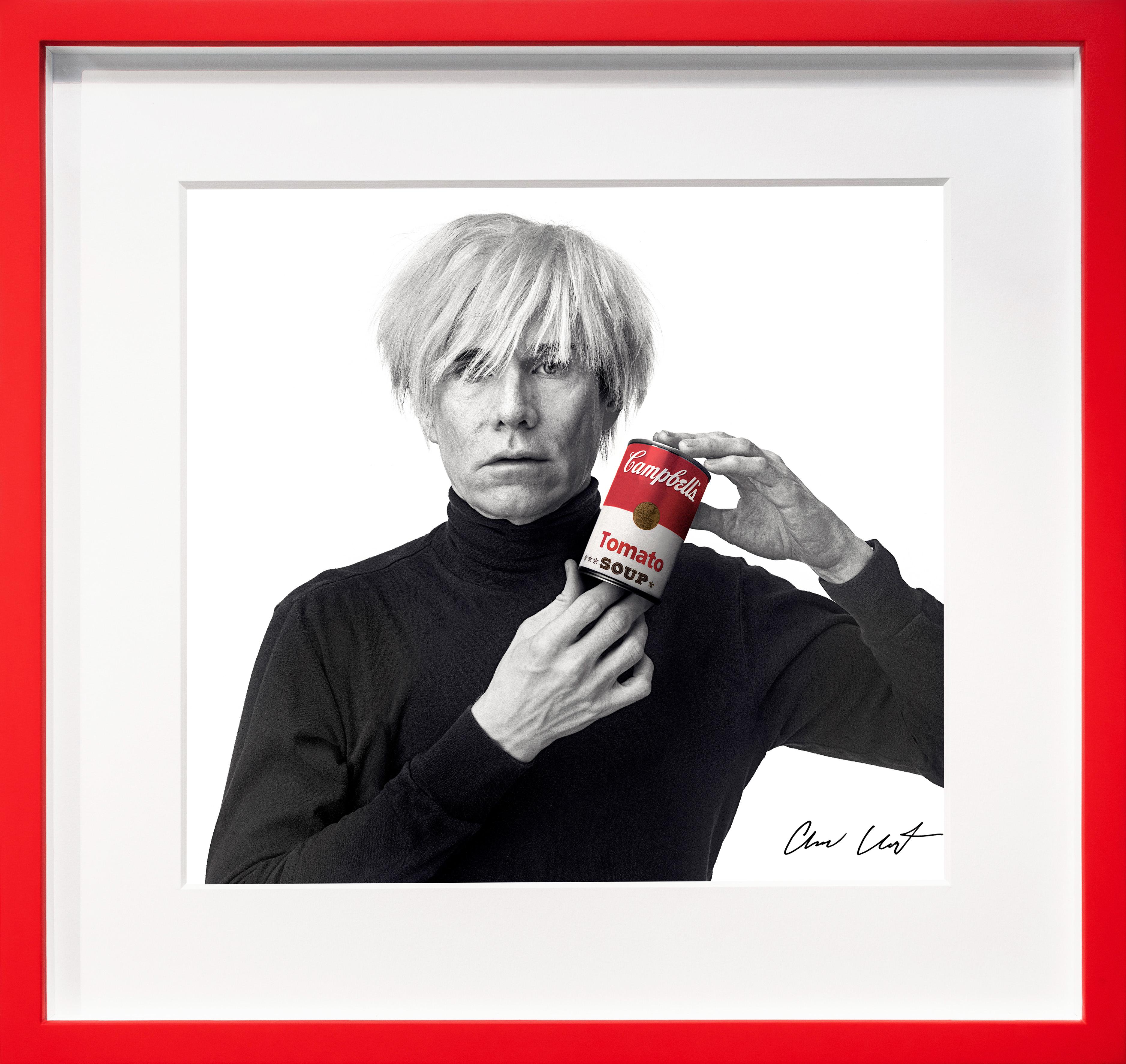 The archival photographic pop-art print, ‘Andy Warhol with Red Campbell’s Soup’  was created in 1985 by photographer Andrew Unangst. Taken in New York City, Unangst had the opportunity to meet and photograph Andy Warhol for a campaign with Vidal