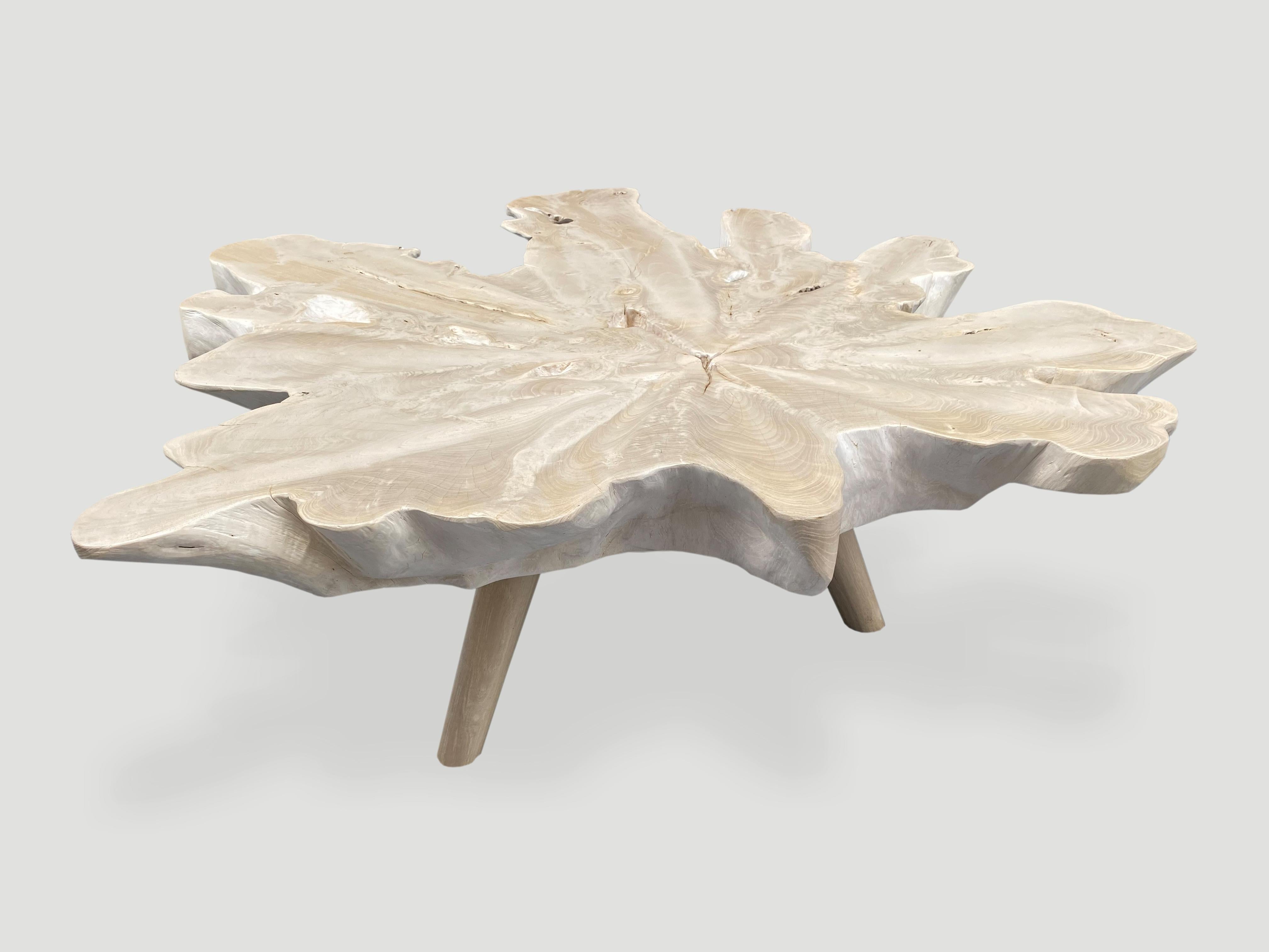 Impressive five inch single slab reclaimed teak wood coffee table. We bleached the teak and added a shellack to the top for protection. Floating on mid century style legs. Organic with a twist. 

The St. Barts Collection features an exciting new