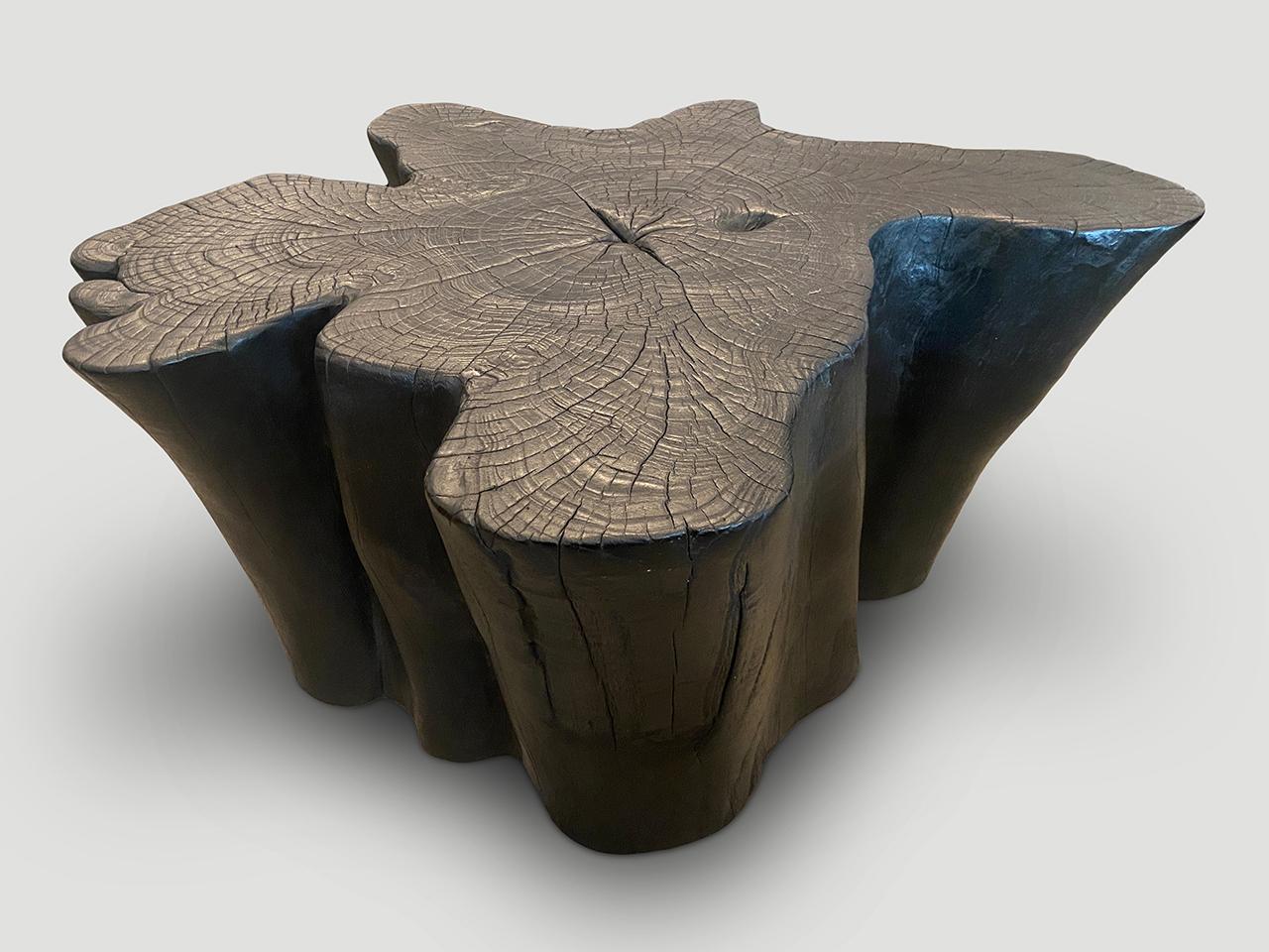 Charred coffee table hand carved from a single reclaimed teak root. A slight graduation from the bottom to the top. Charred, sanded and sealed revealing the beautiful wood grain. We have a collection that can be placed together for a larger modular