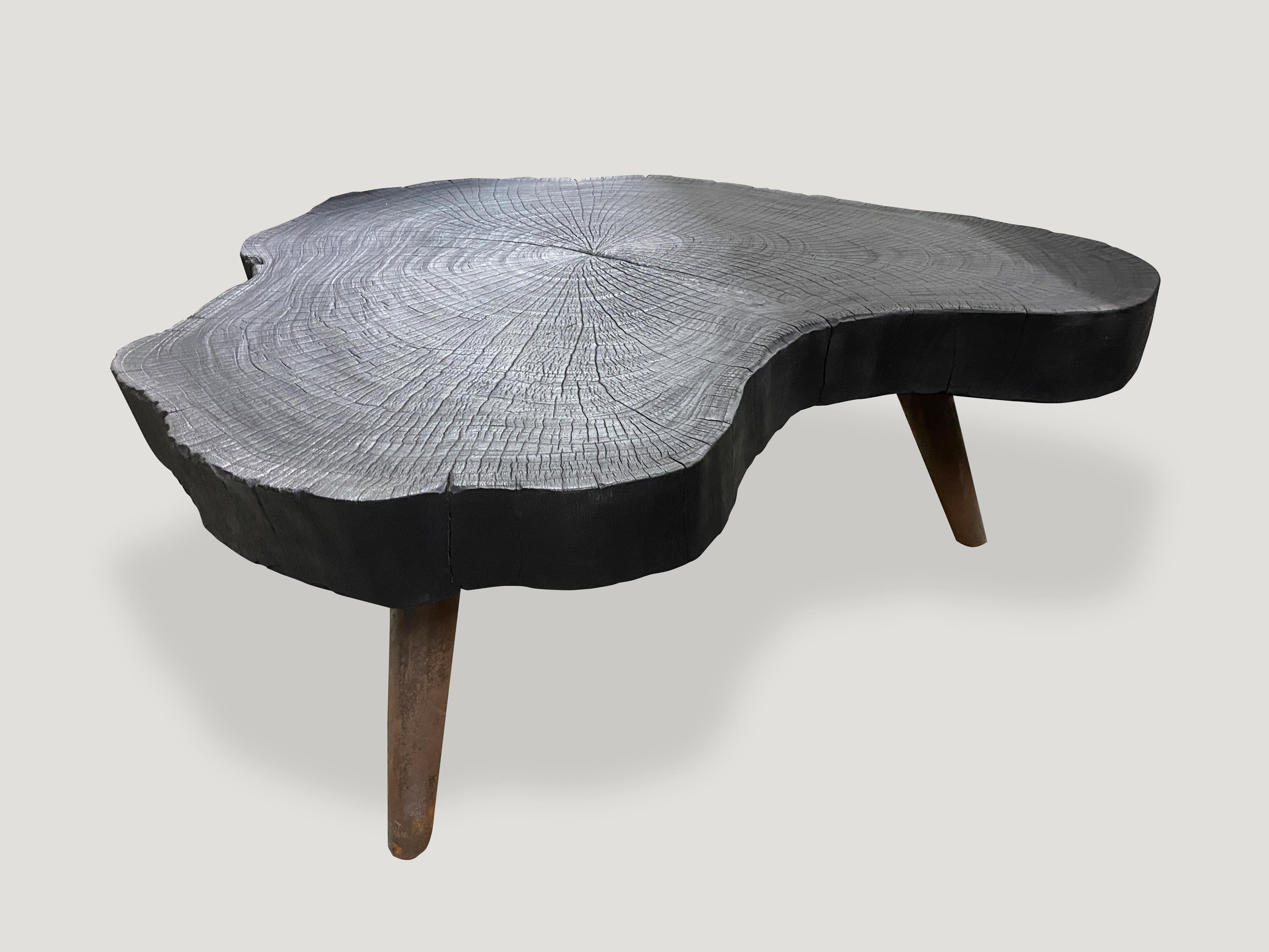 Single four inch slab coffee table charred and set on a mid century style burnt metal base, which we can also finish In pure black if preferred. Burnt sanded and sealed exposing the beautiful grain of the wood.

The Triple Burnt Collection