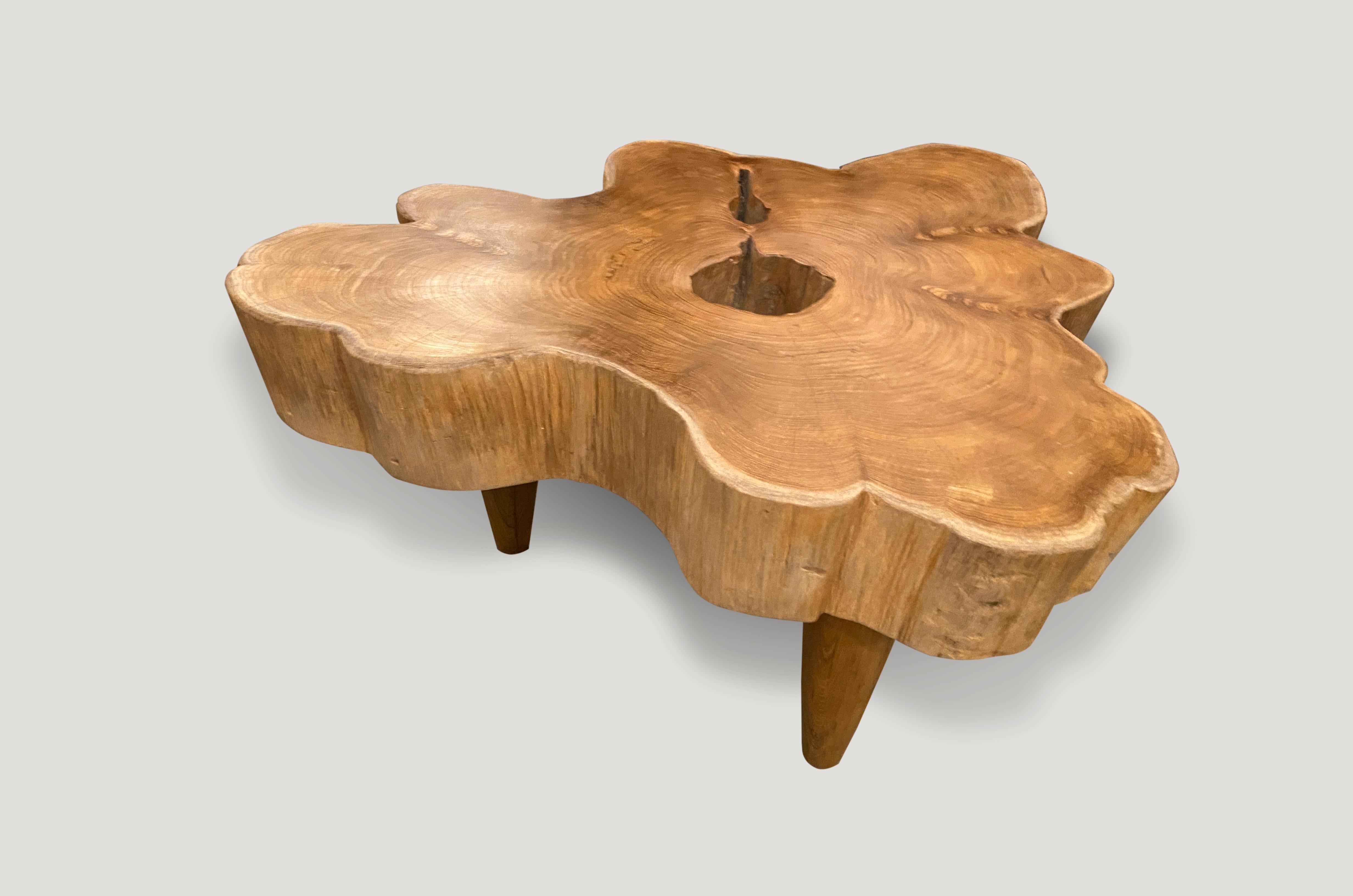 Reclaimed teak coffee table with a natural oil finish on the top and the sides smooth and left raw. Impressive single 5” slab top floating on mid century style legs. Organic with a twist. All one of a kind.

Own an Andrianna Shamaris