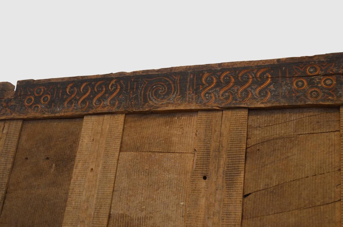 Ancient hand carved architectural panel from Toraja. The carving symbolizes the protection of the home and was used as an exterior panel.

This ancient carving was sourced in the spirit of wabi-sabi, a Japanese philosophy that beauty can be found