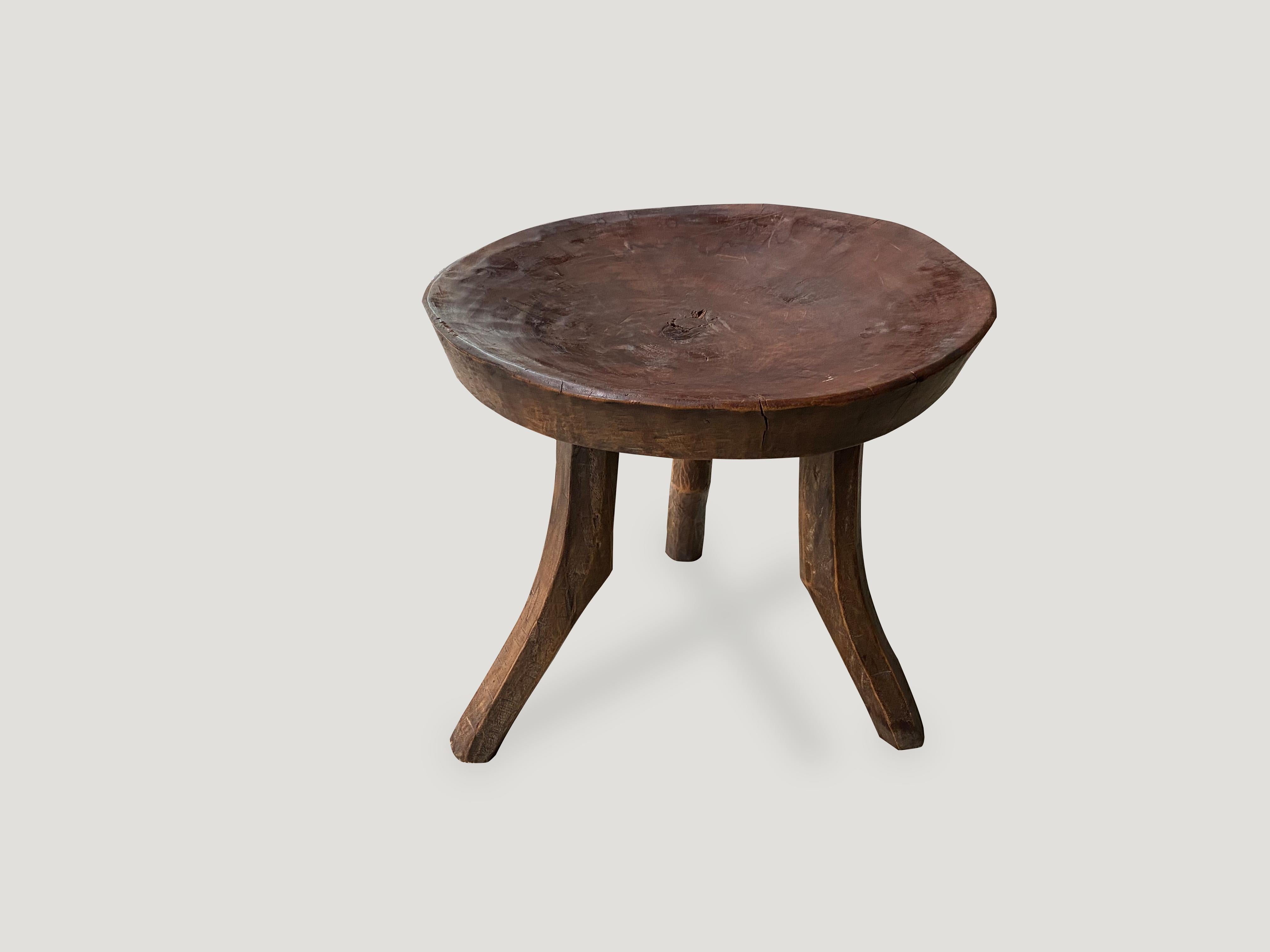Hand carved sculptural African mahogany stool or side table. Great for placing a book or perhaps towels in a bathroom, magazines etc.

This stool was sourced in the spirit of wabi-sabi, a Japanese philosophy that beauty can be found in