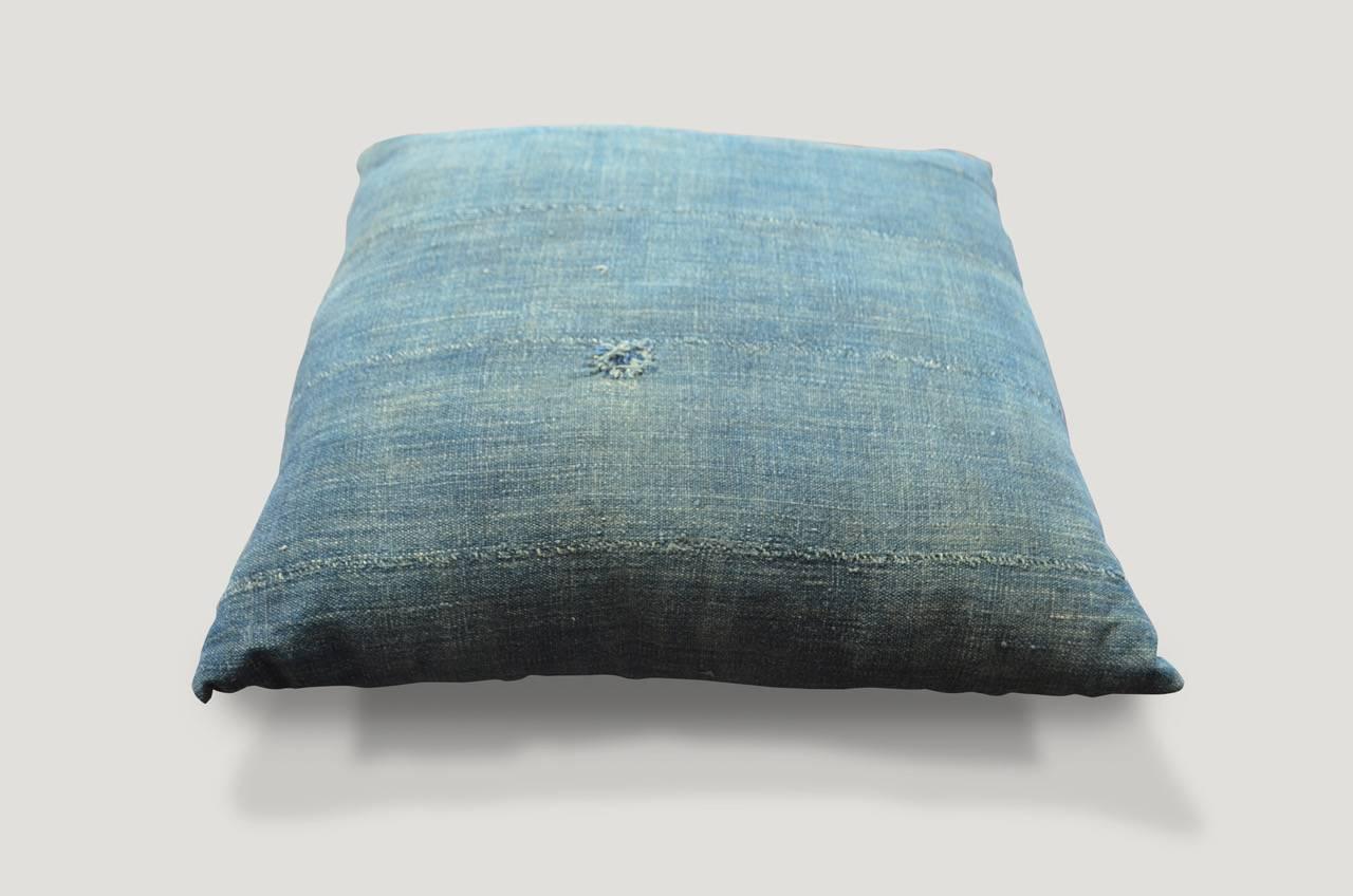 Beautiful 19th century indigo textiles from Africa, made into fabulous pillows. Antique textile on both sides with concealed zipper and inserts included. Large collection available. All unique. The price reflects one.

Andrianna Shamaris. The