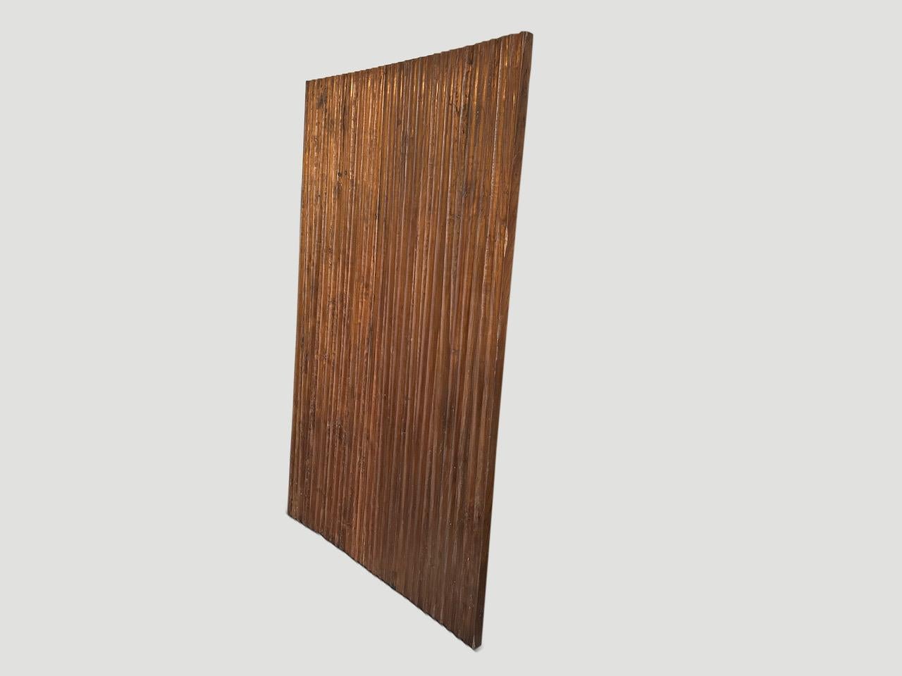 One of a kind antique, hand carved teak wood panel that can be used as a room divider, head board, wall panel or coffee table. We can add a metal or wooden base. Please inquire. Polished with a natural oil revealing the beautiful wood grain.

This