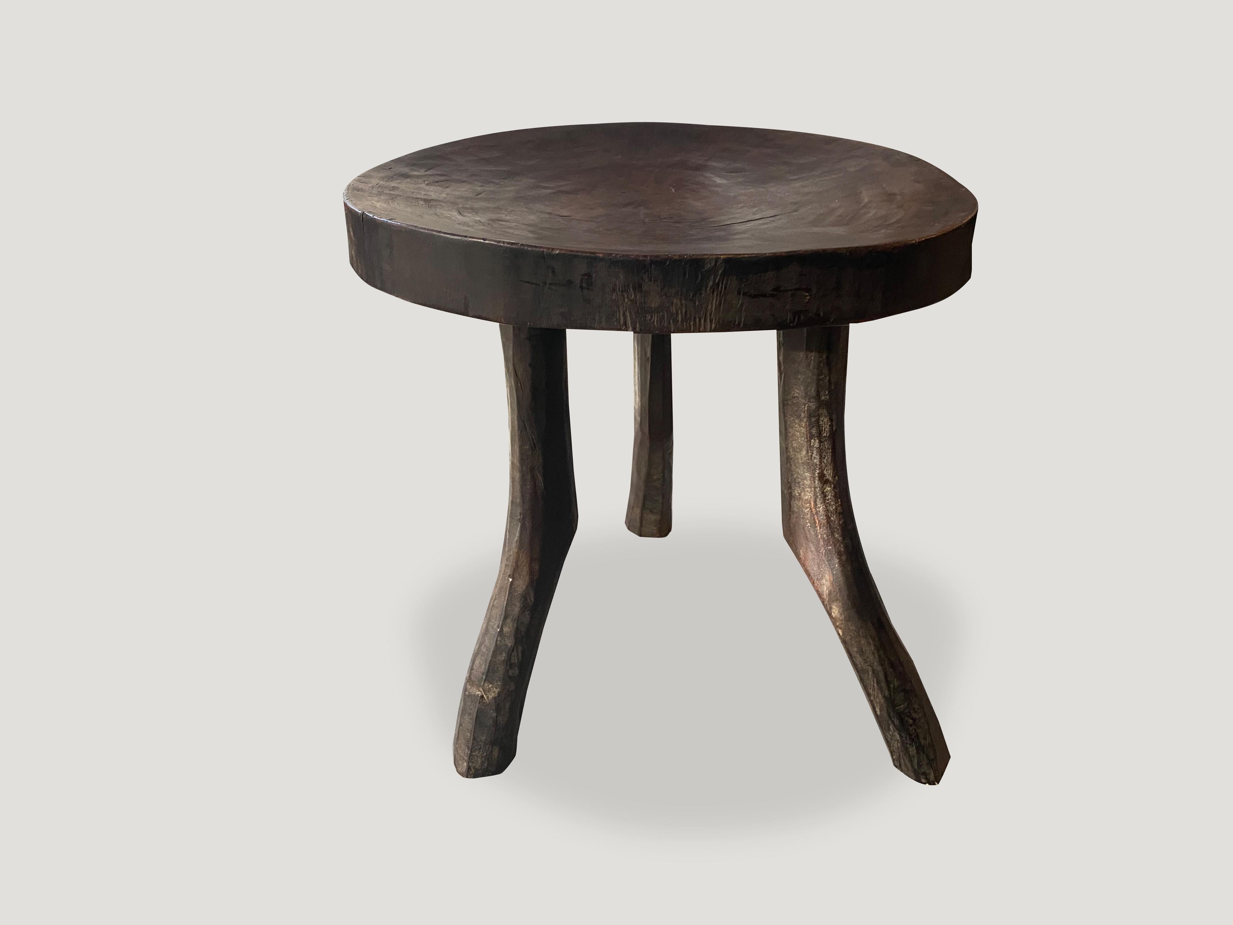 Hand carved sculptural African mahogany stool or side table. Great for placing a book or perhaps towels in a bathroom, magazines etc.

This stool or side table was sourced in the spirit of wabi-sabi, a Japanese philosophy that beauty can be found