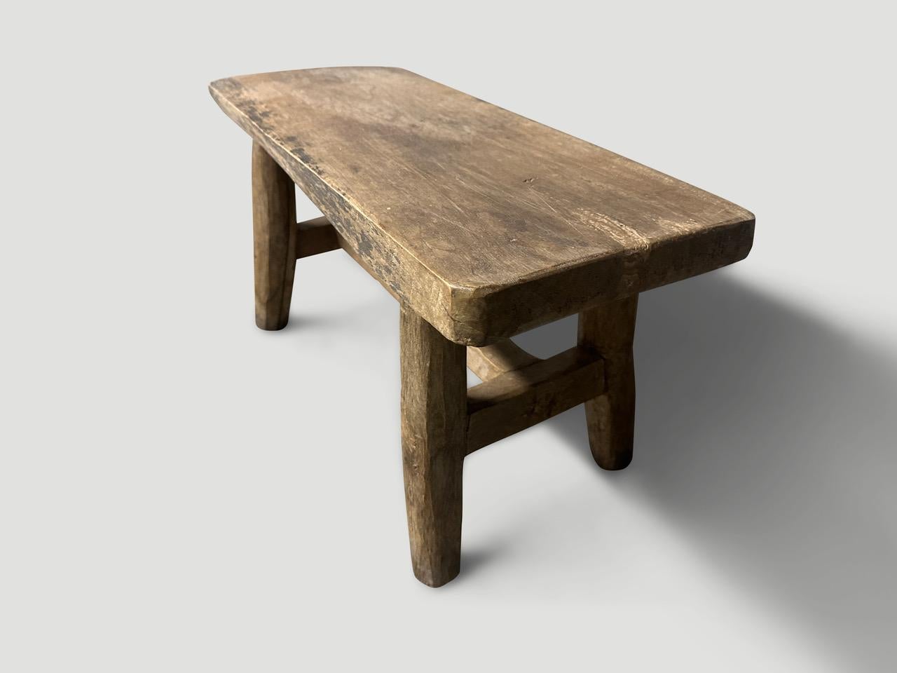 Antique hand made side table or small bench with a 1.5” thick top. Lovely patina and character on this beautiful piece. Circa 1950

This side table or small bench was hand made in the spirit of Wabi-Sabi, a Japanese philosophy that beauty can be
