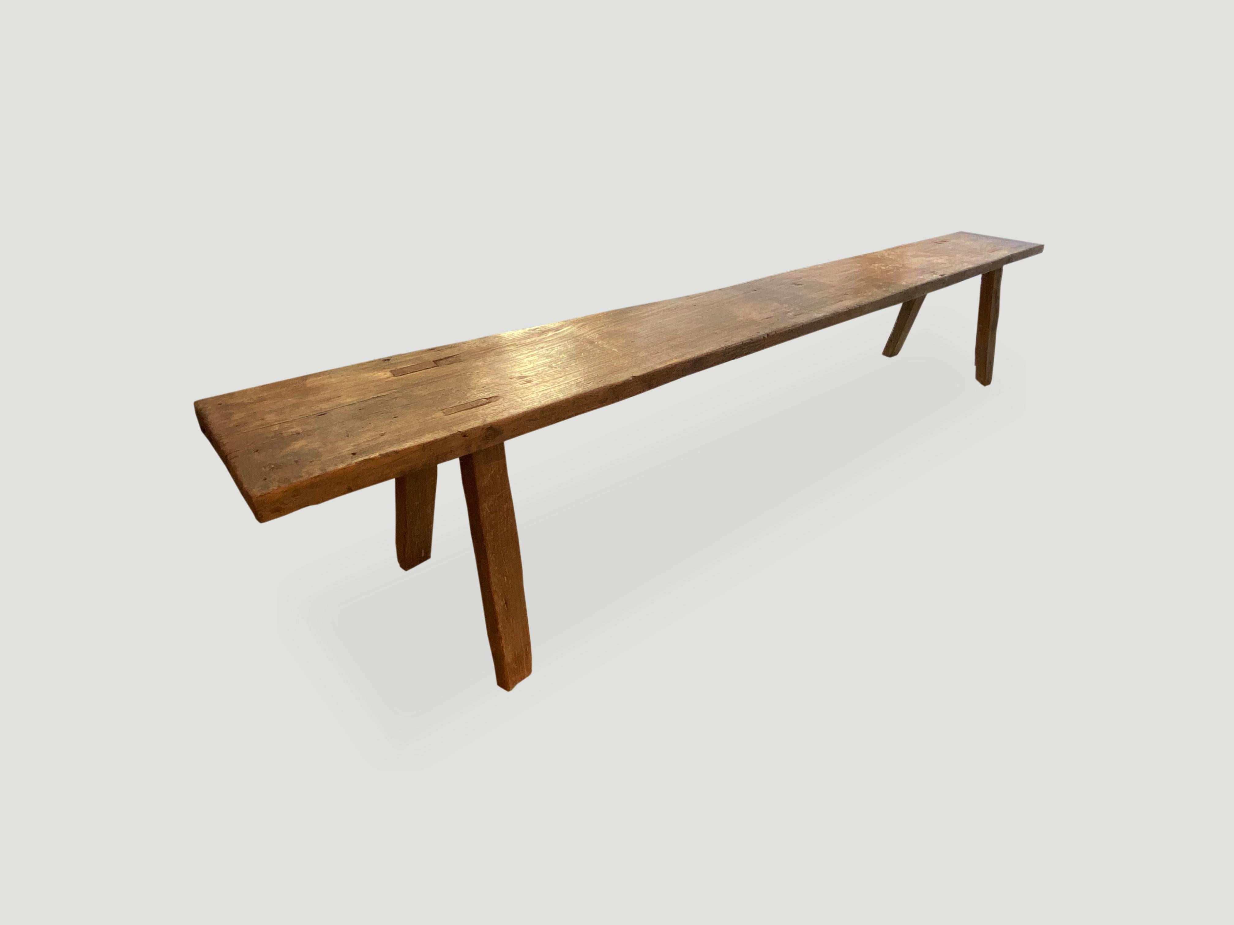 Antique wabi bench made from a single reclaimed teak wood panel. Perfection is imperfection.

This bench was sourced in the spirit of wabi-sabi, a Japanese philosophy that beauty can be found in imperfection and impermanence. It is a beauty of