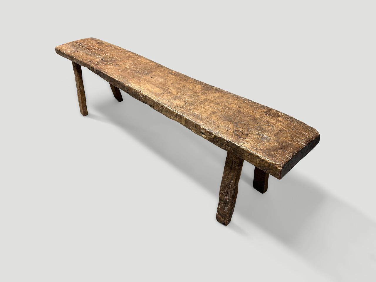 Beautiful antique bench hand made from a single two inch thick slab of teak wood with lovely patina. Circa 1930.

This bench was hand made in the spirit of Wabi-Sabi, a Japanese philosophy that beauty can be found in imperfection and impermanence.