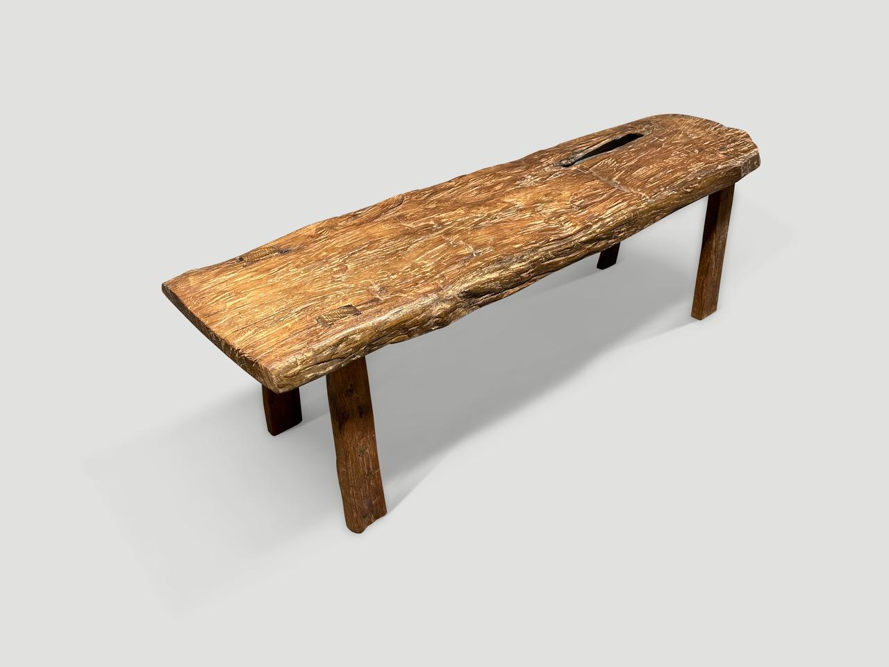 Beautiful antique bench hand made from a single thick slab of teak wood with lovely patina. Circa 1950.

This bench was hand made in the spirit of Wabi-Sabi, a Japanese philosophy that beauty can be found in imperfection and impermanence. It is a