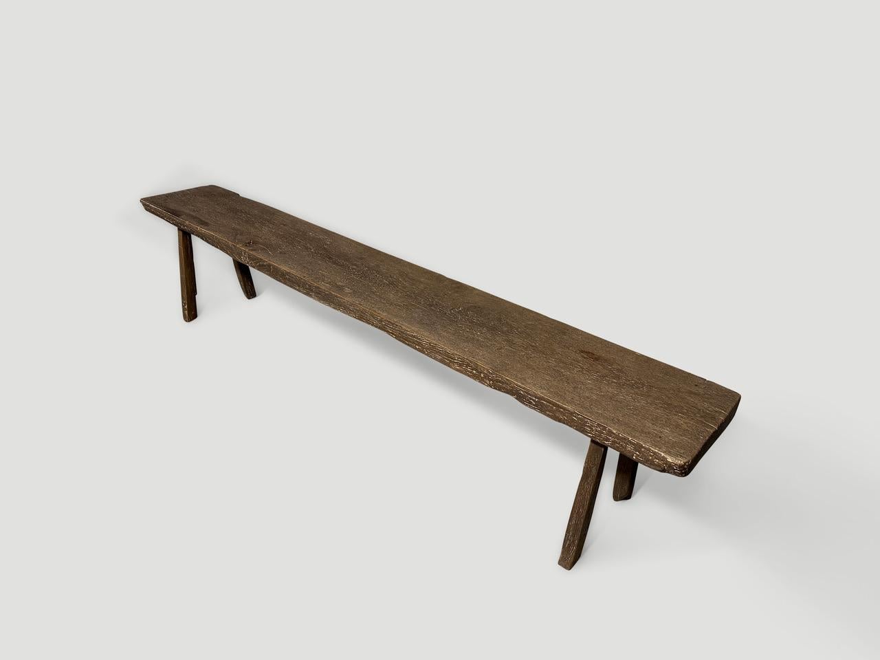 Antique bench hand made from a two inch thick single panel of teak wood with lovely character and patina. Circa 1950.

This bench was hand made in the spirit of Wabi-Sabi, a Japanese philosophy that beauty can be found in imperfection and
