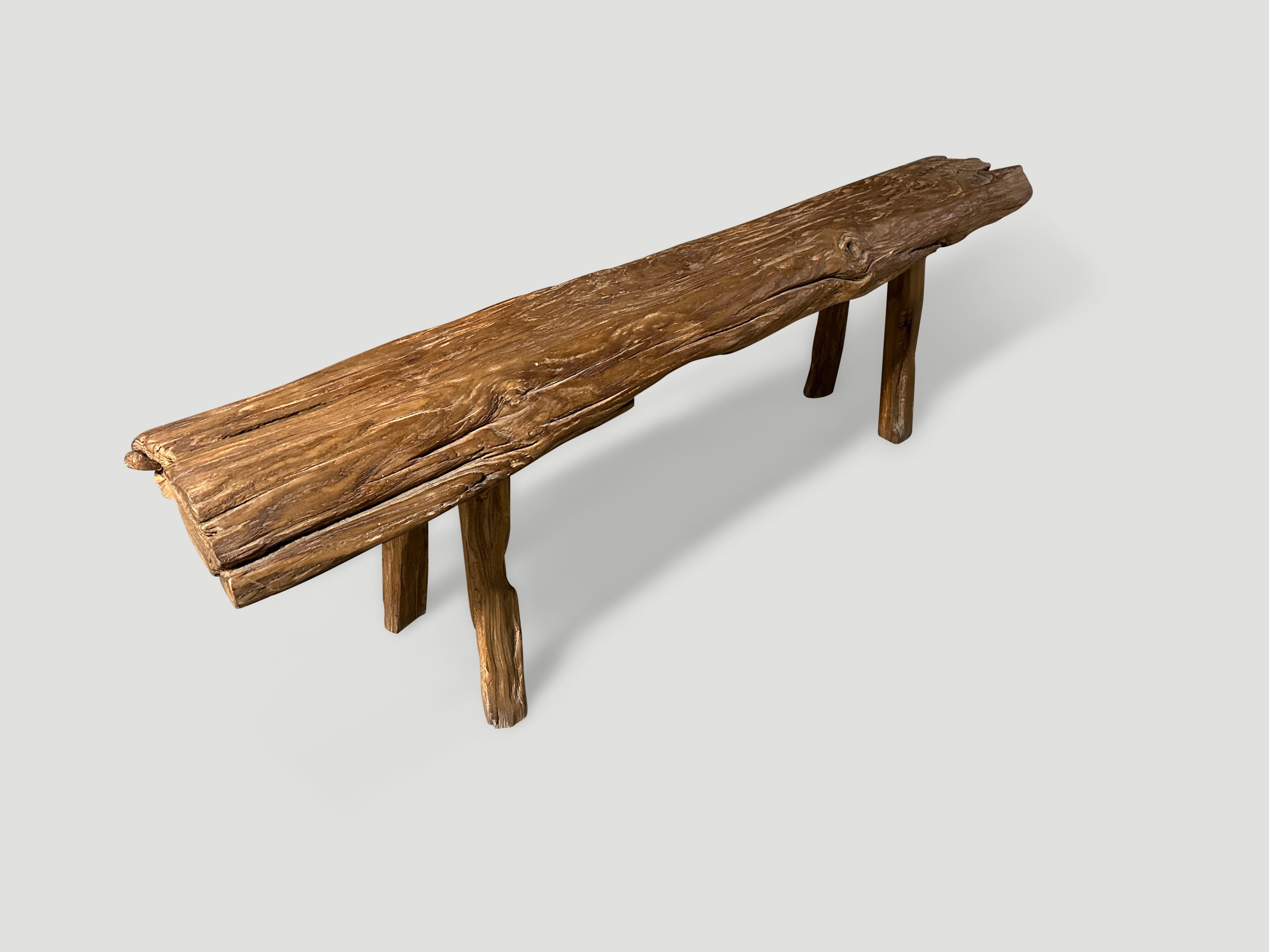 Antique bench with beautiful character hand made from a single 3.5″ thick teak log with lovely patina. Circa 1950. The width varies from 11-9” wide.

This bench was hand made in the spirit of Wabi-Sabi, a Japanese philosophy that beauty can be found