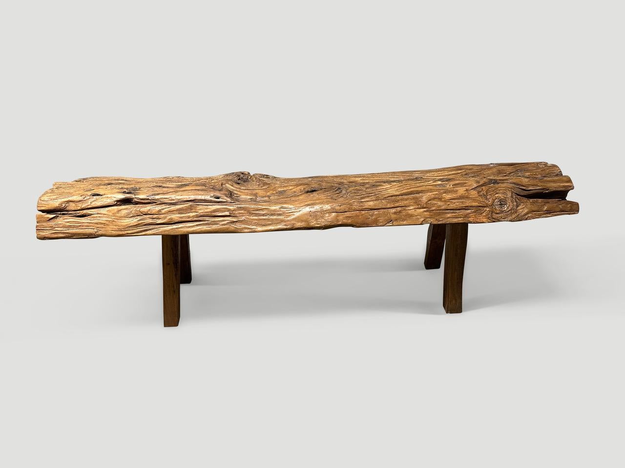 Antique bench with beautiful character hand made from a single thick teak log with lovely patina. Both usable and sculptural. Circa 1950.

This bench was hand made in the spirit of Wabi-Sabi, a Japanese philosophy that beauty can be found in