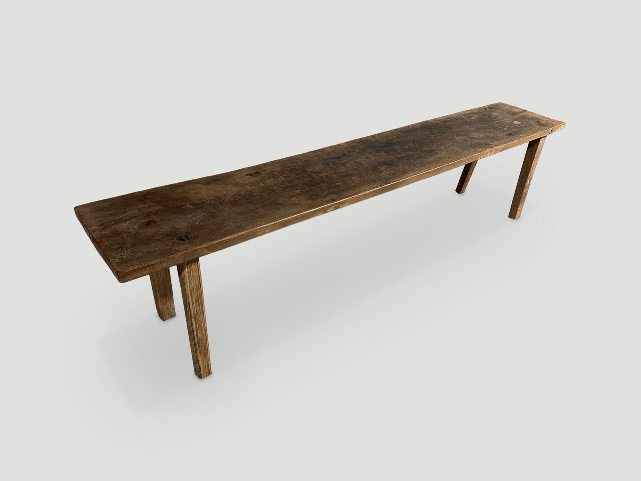 Beautiful antique single teak panel with lovely patina. We added legs to this aged panel.

This bench was hand made in the spirit of Wabi-Sabi, a Japanese philosophy that beauty can be found in imperfection and impermanence. It is a beauty of