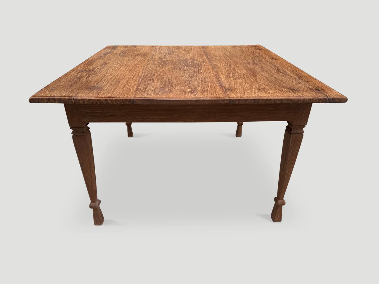 Antique teak dining table with a hand carved bevelled edge and fluted legs with beautiful patina. Perfect as a dining table, entrance table or desk. Circa 1900

This table was sourced in the spirit of Wabi-Sabi a Japanese philosophy that beauty can