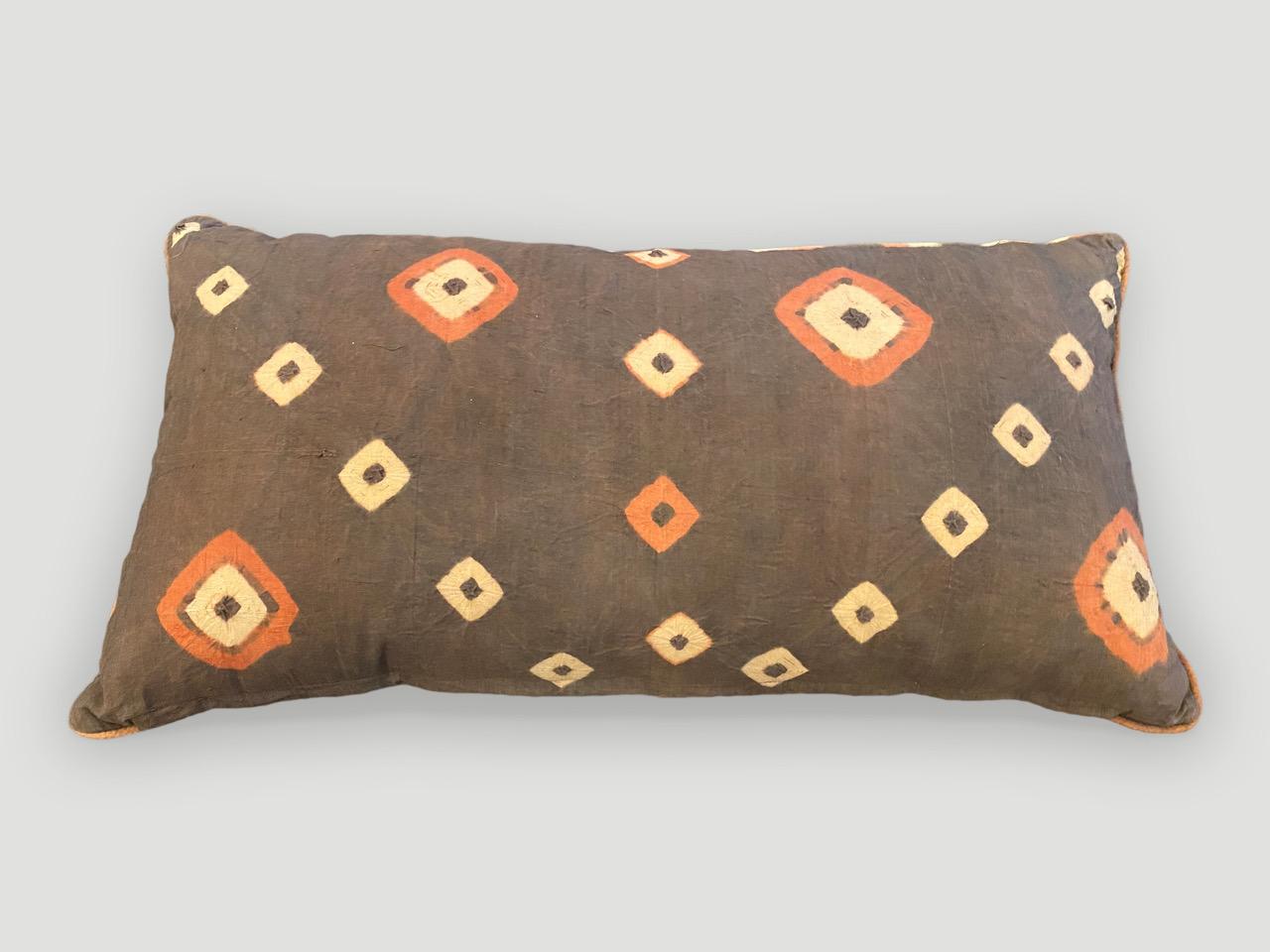 Beautiful antique textiles found in Toraja Land, South Sulawesi, are made into pillows with piping and concealed zippers. Double backed with stunning contrasting colors. Inserts included. A blend of cotton and linen. 

Andrianna Shamaris. The