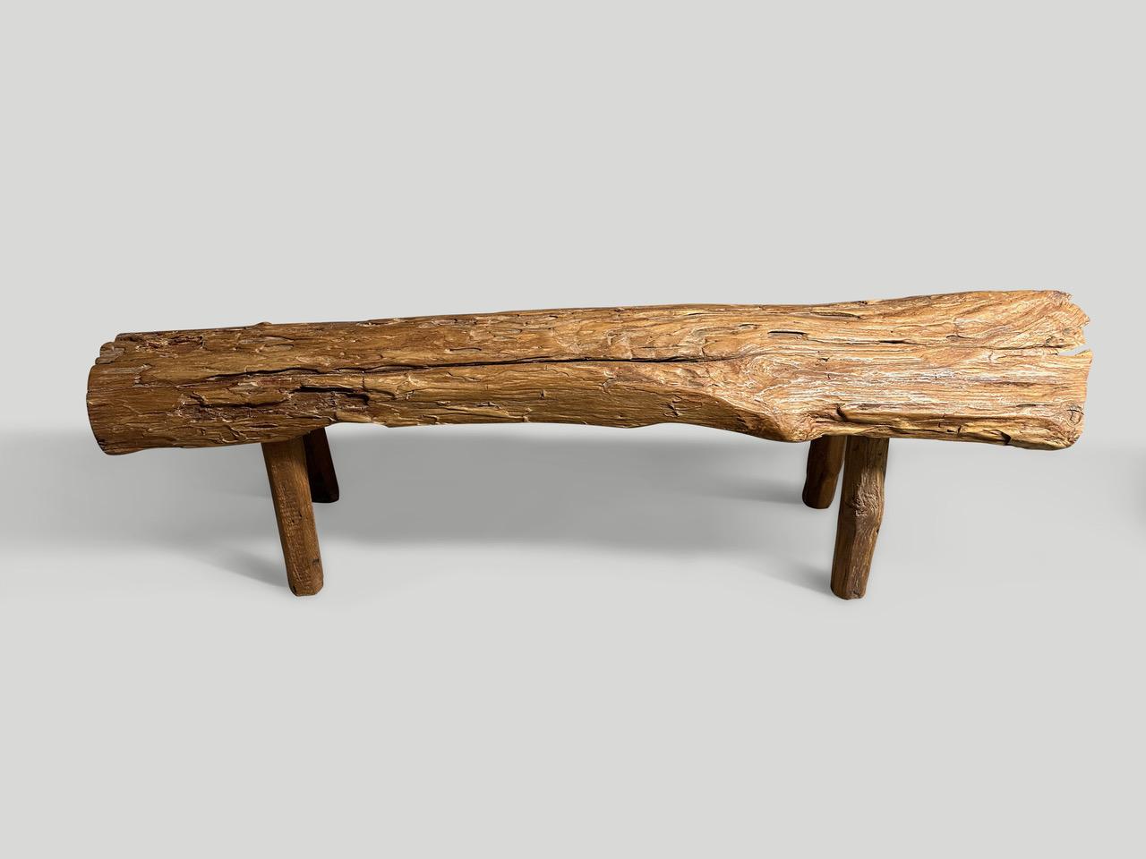 Antique bench with beautiful character hand made from a single thick teak log with lovely patina. Both usable and sculptural. Circa 1950.

This bench was hand made in the spirit of Wabi-Sabi, a Japanese philosophy that beauty can be found in