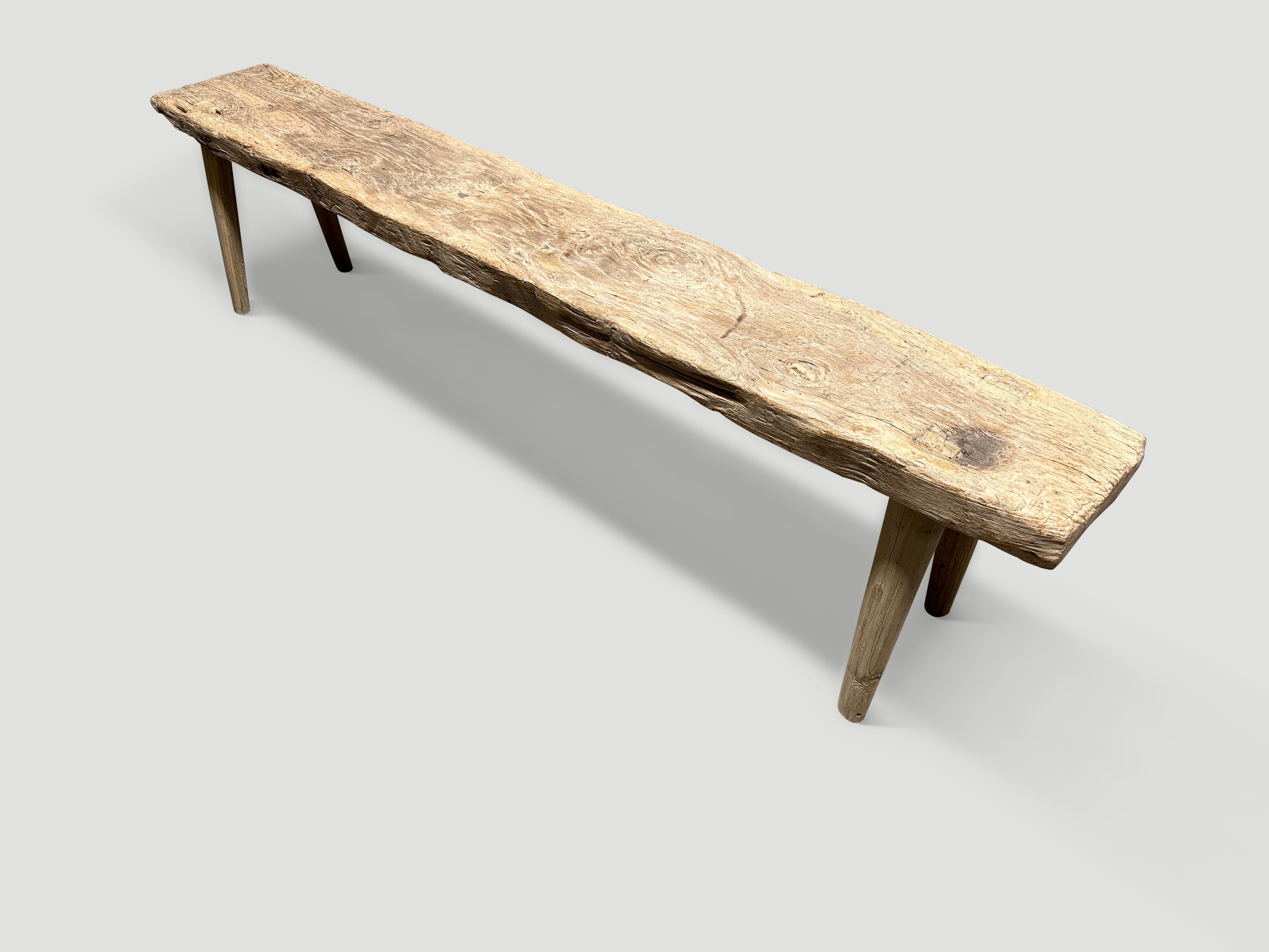 A single thick antique panel with lovely character within the wood. We added smooth teak minimalist legs to produce this beautiful bench and finished with a secret ingredient, revealing the unique wood grain. It’s all in the details. 

This bench