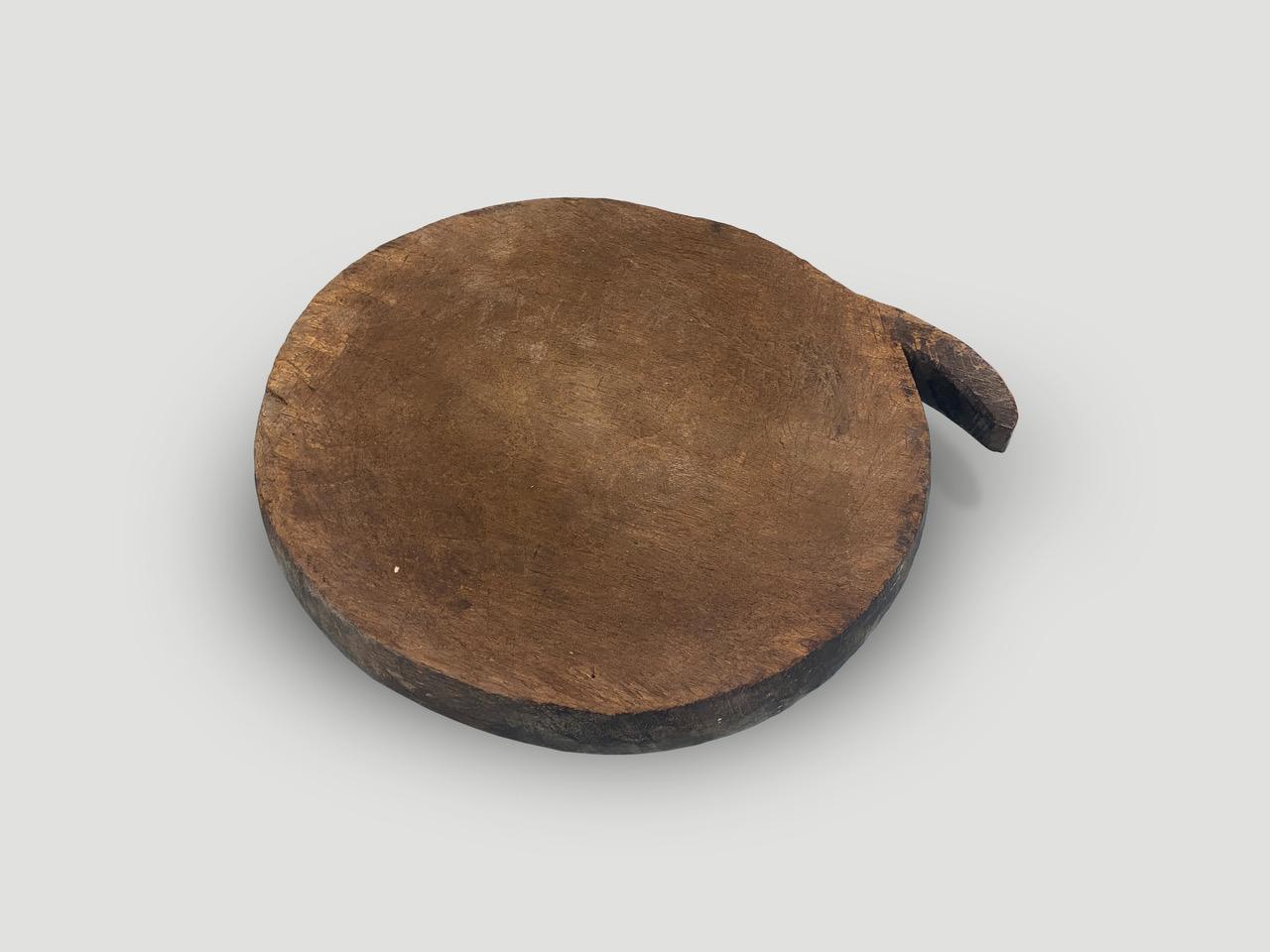 Beautiful wood platter hand carved out of a single piece of wood that works well as a cheese board.

This wood platter was handmade in the spirit of Wabi-Sabi, a Japanese philosophy that beauty can be found in imperfection and impermanence. It is
