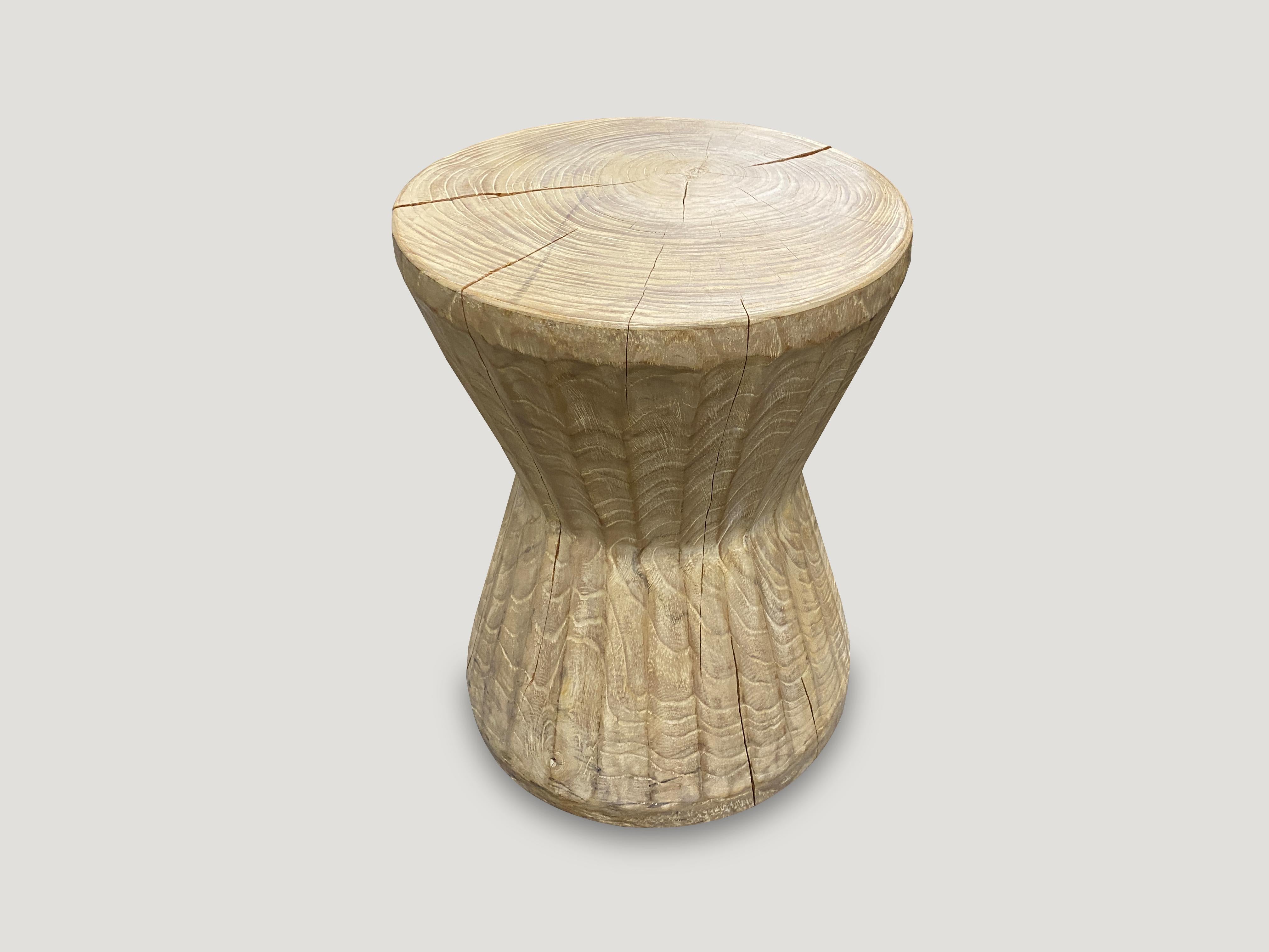 Hand carved beveled side table or stool that celebrates cracks and crevices found in reclaimed teak wood. We have added a ceruse finish.

Andrianna Shamaris. The Leader In Modern Organic Design.