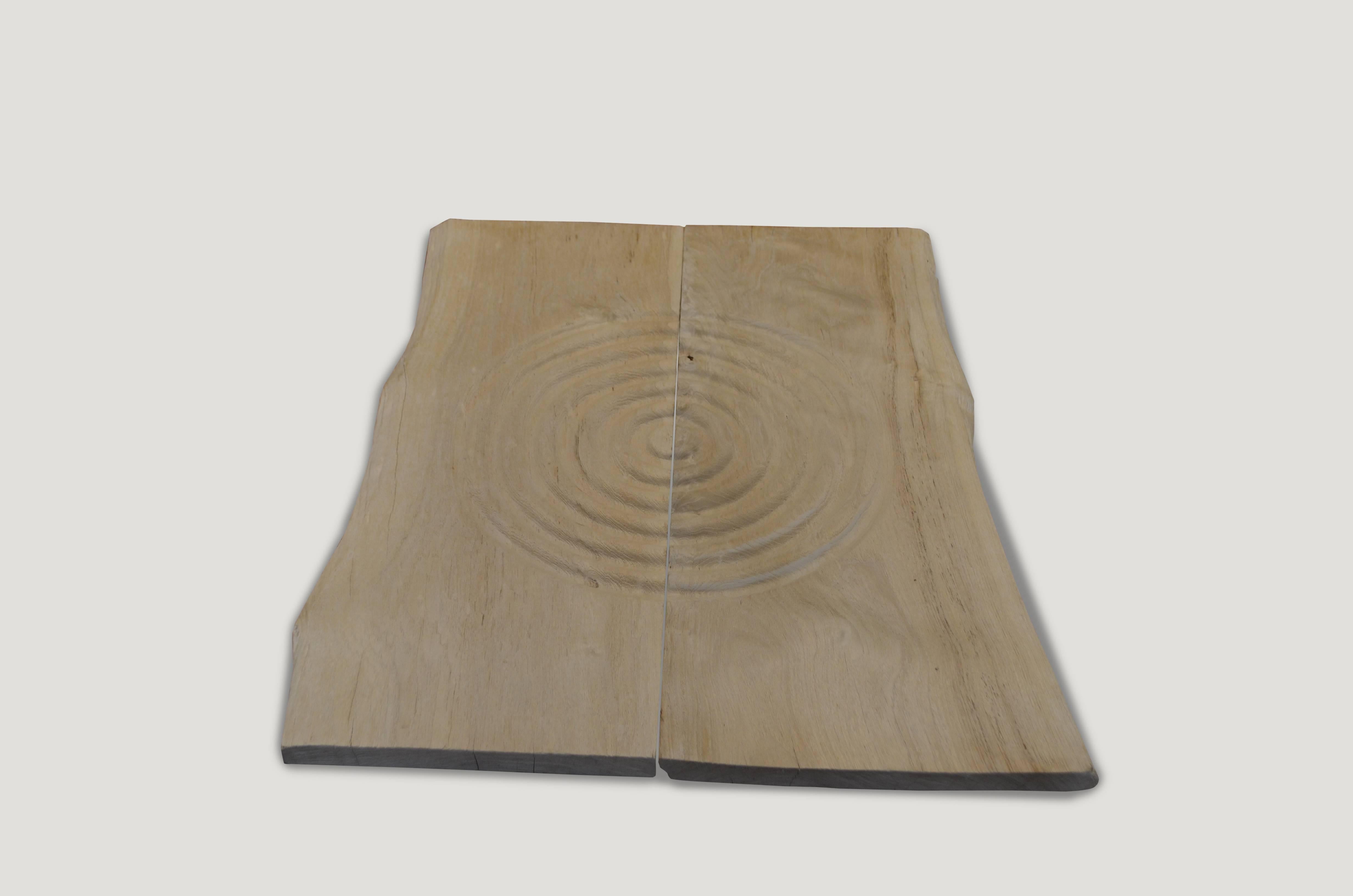 Bleached reclaimed teak wood panel. Hand carved minimalist circle with a natural live edge. Beautiful hanging on a wall vertical or horizontal, placed together or with a space between. Organic is the new modern.

The St. Barts collection features
