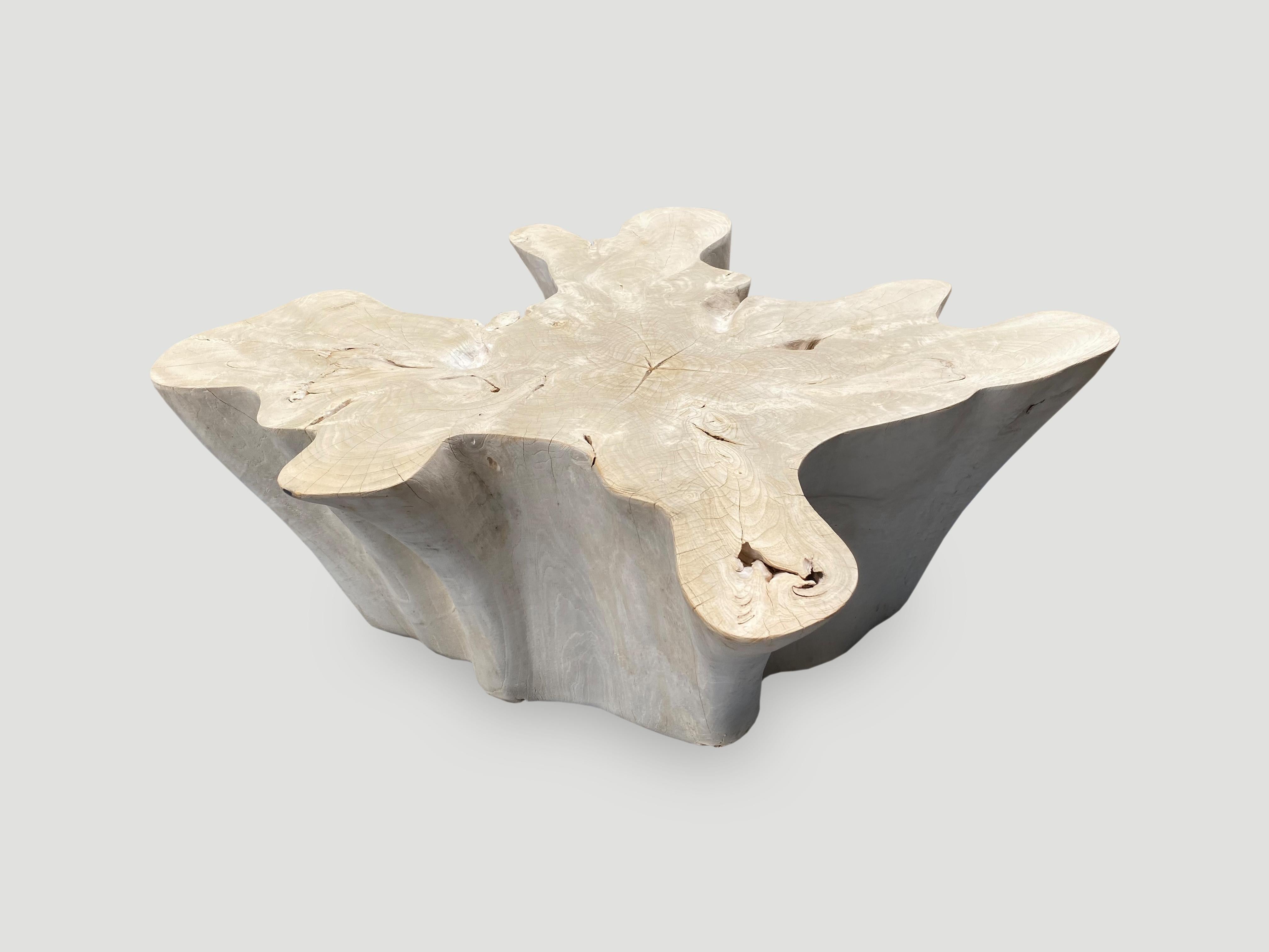 Impressive reclaimed bleached teak amorphous coffee table. A slight graduation from the bottom to the top. We have added a shellack to the top for a slight bone contrast and protection. The final image show the collection and how they can work