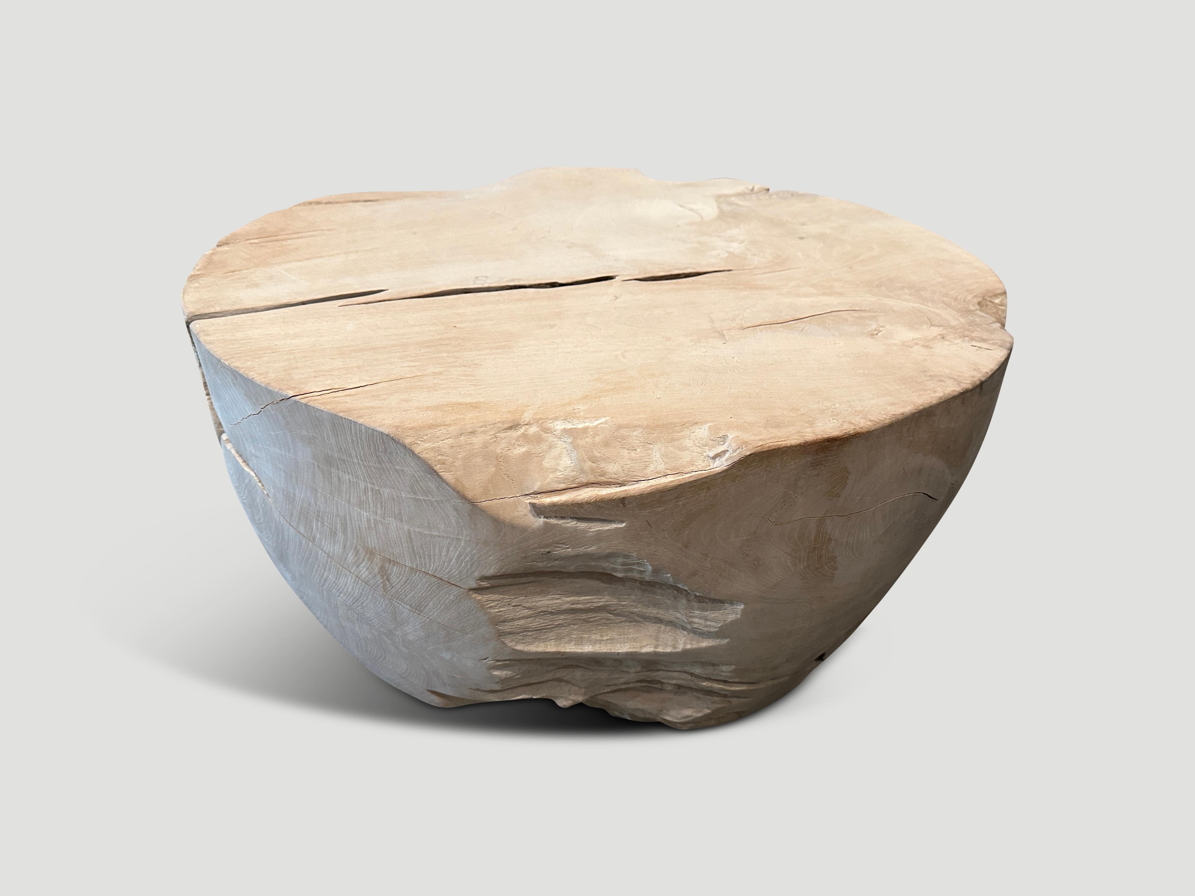 Reclaimed teak root coffee table hand carved into a drum shape whilst respecting the natural organic wood. We added a light white wash revealing the beautiful wood grain. Both usable and sculptural.

The St. Barts Collection features an exciting
